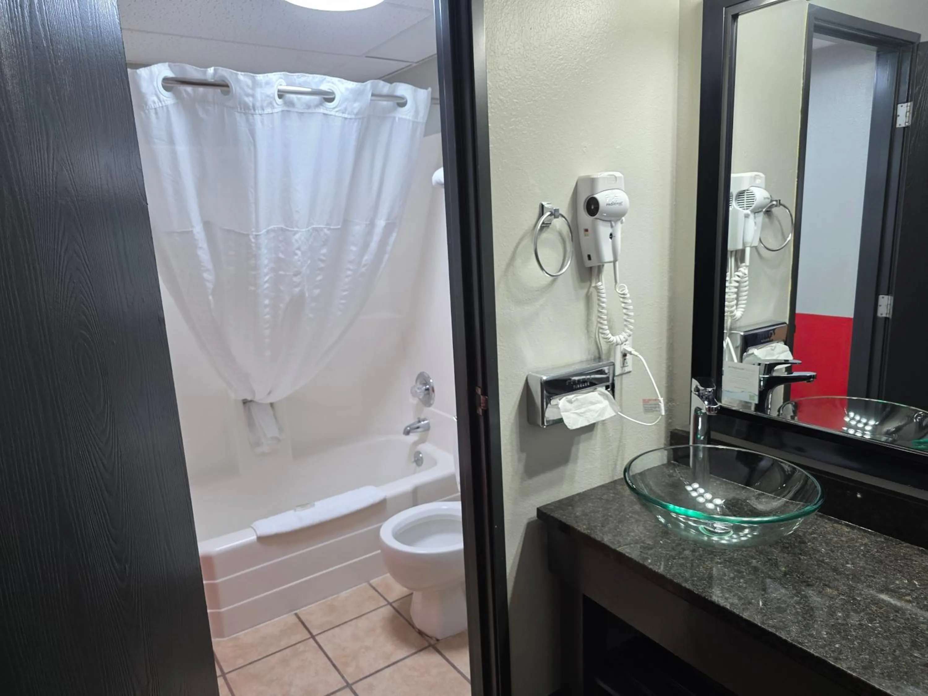 Bathroom in Super 8 by Wyndham Rapid City