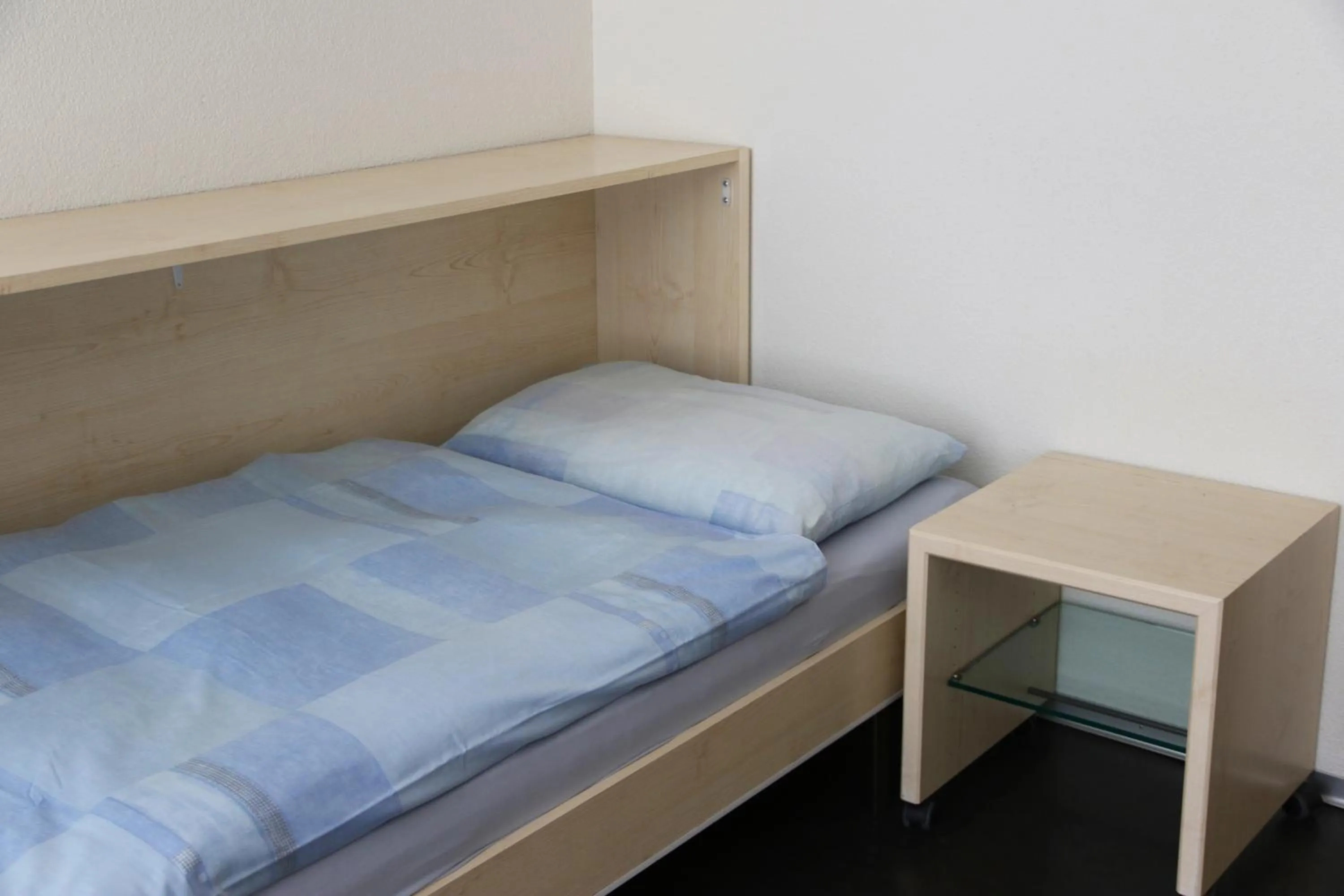 Bed in Richemont Hotel