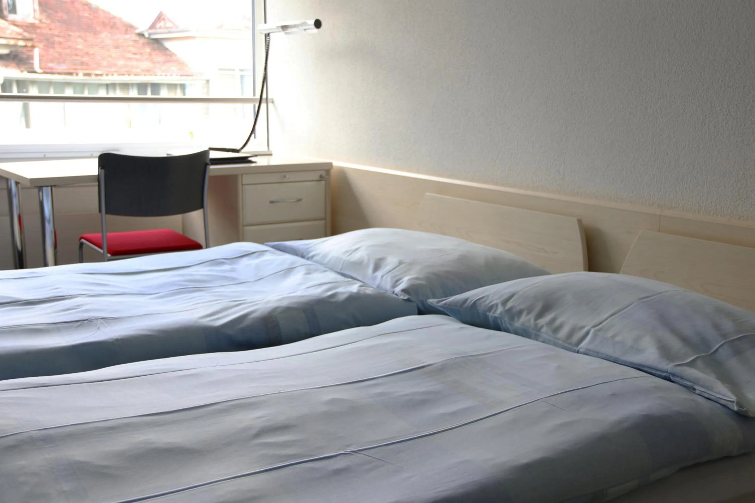 Bed in Richemont Hotel