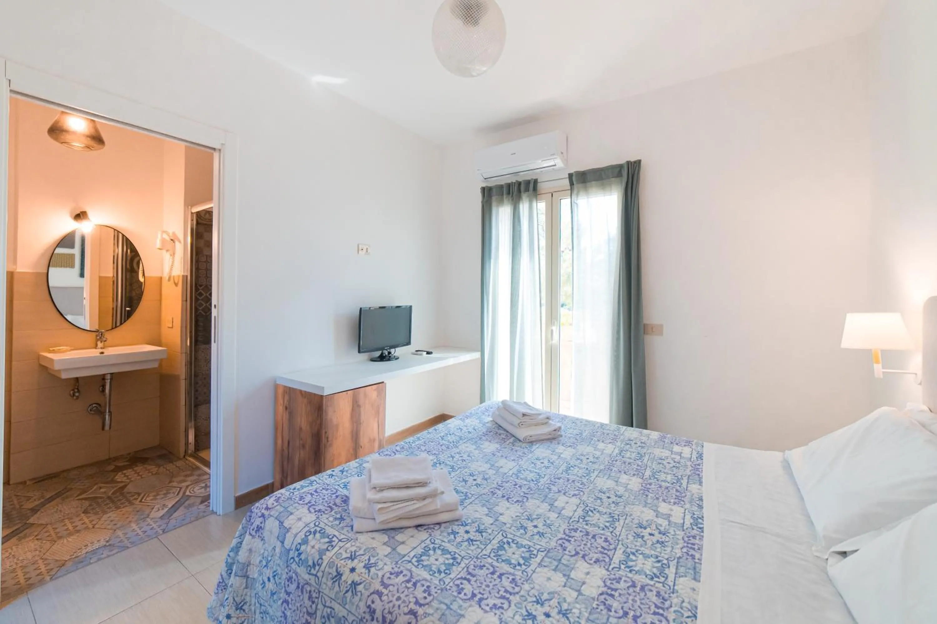 Bed in Hotel Villino Gallodoro