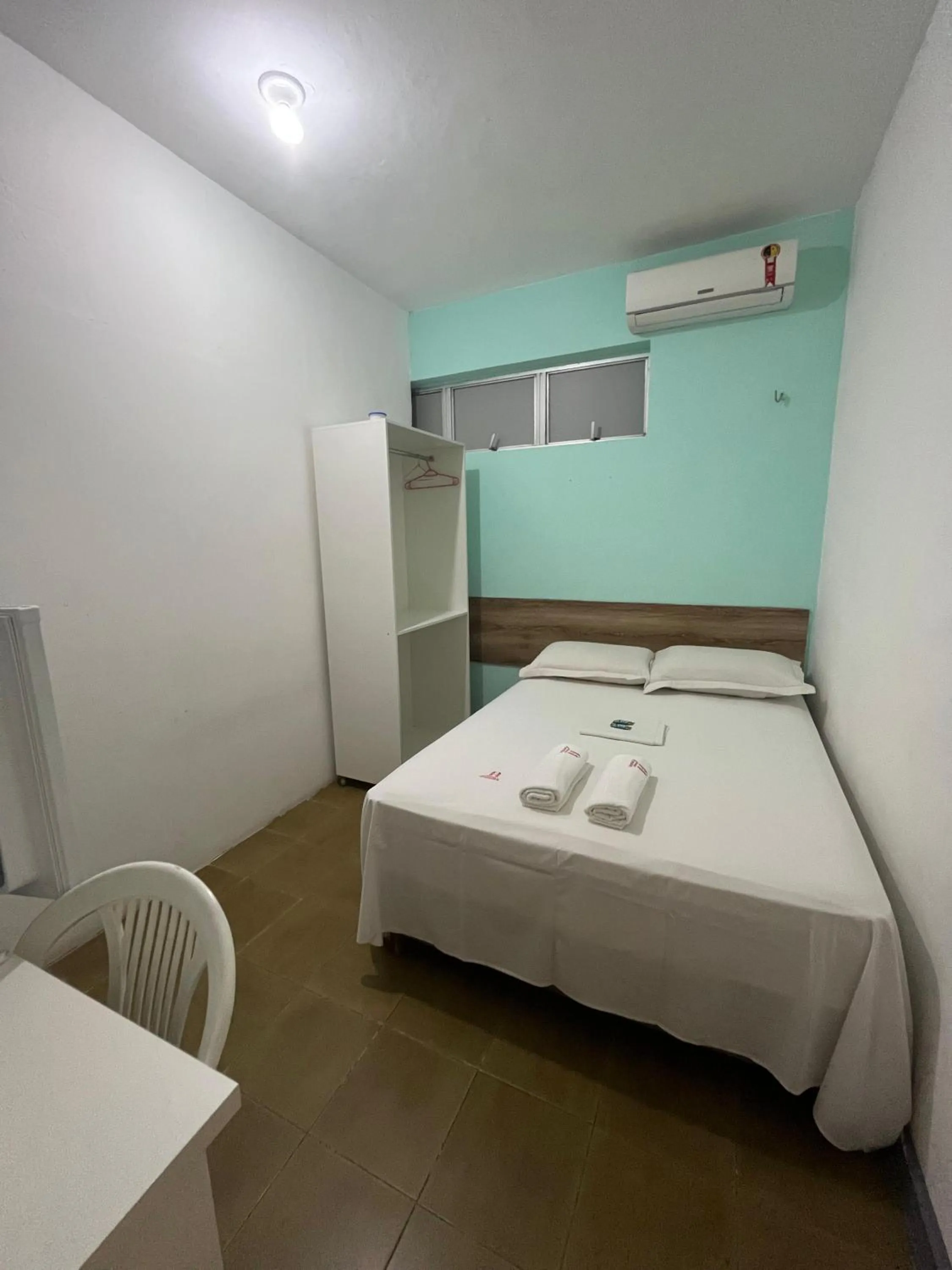 Bed in Pousada Executiva