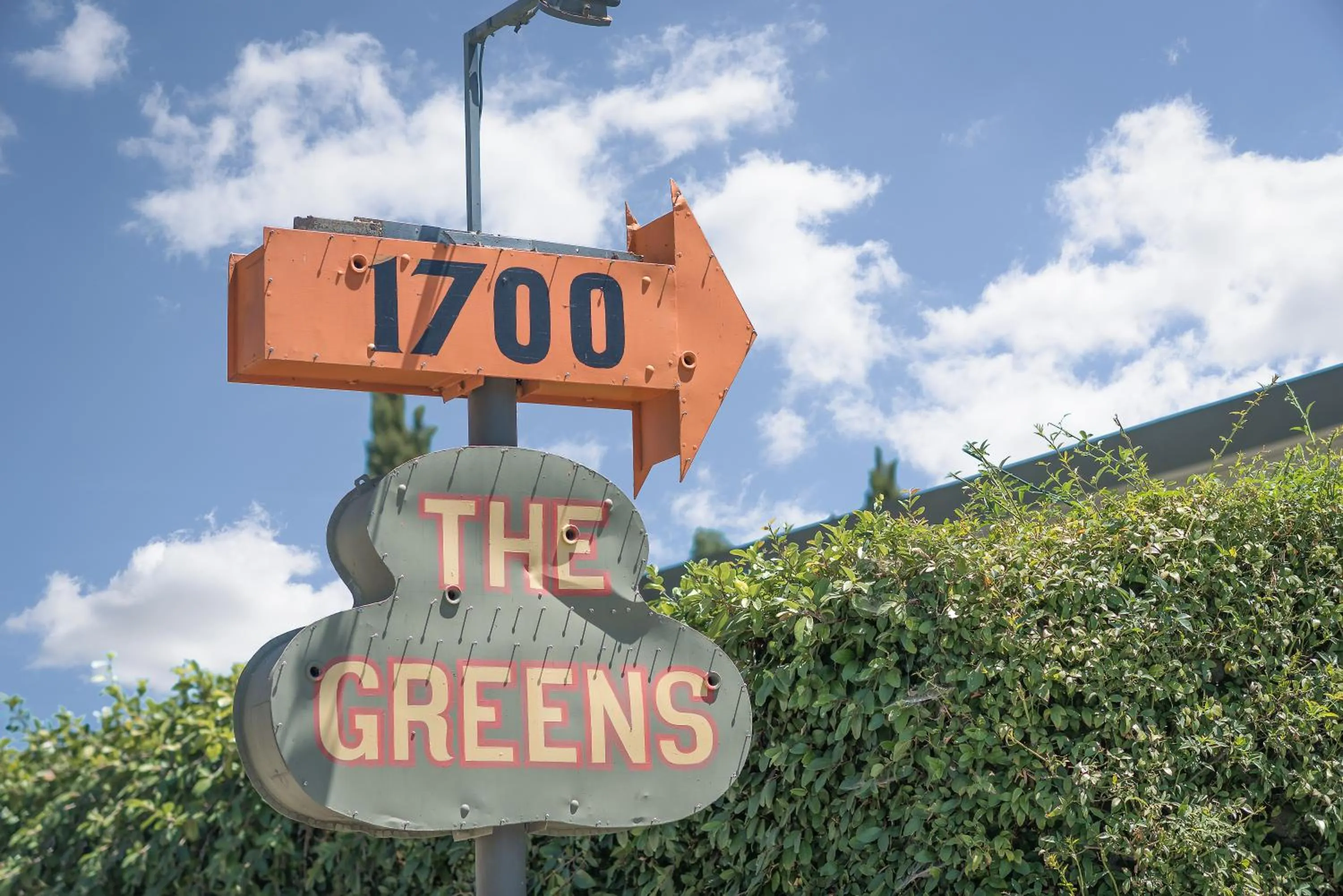 Property logo or sign in The Greens Hotel on Del Paso