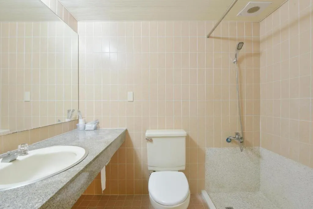 Toilet in Back Home Hotel