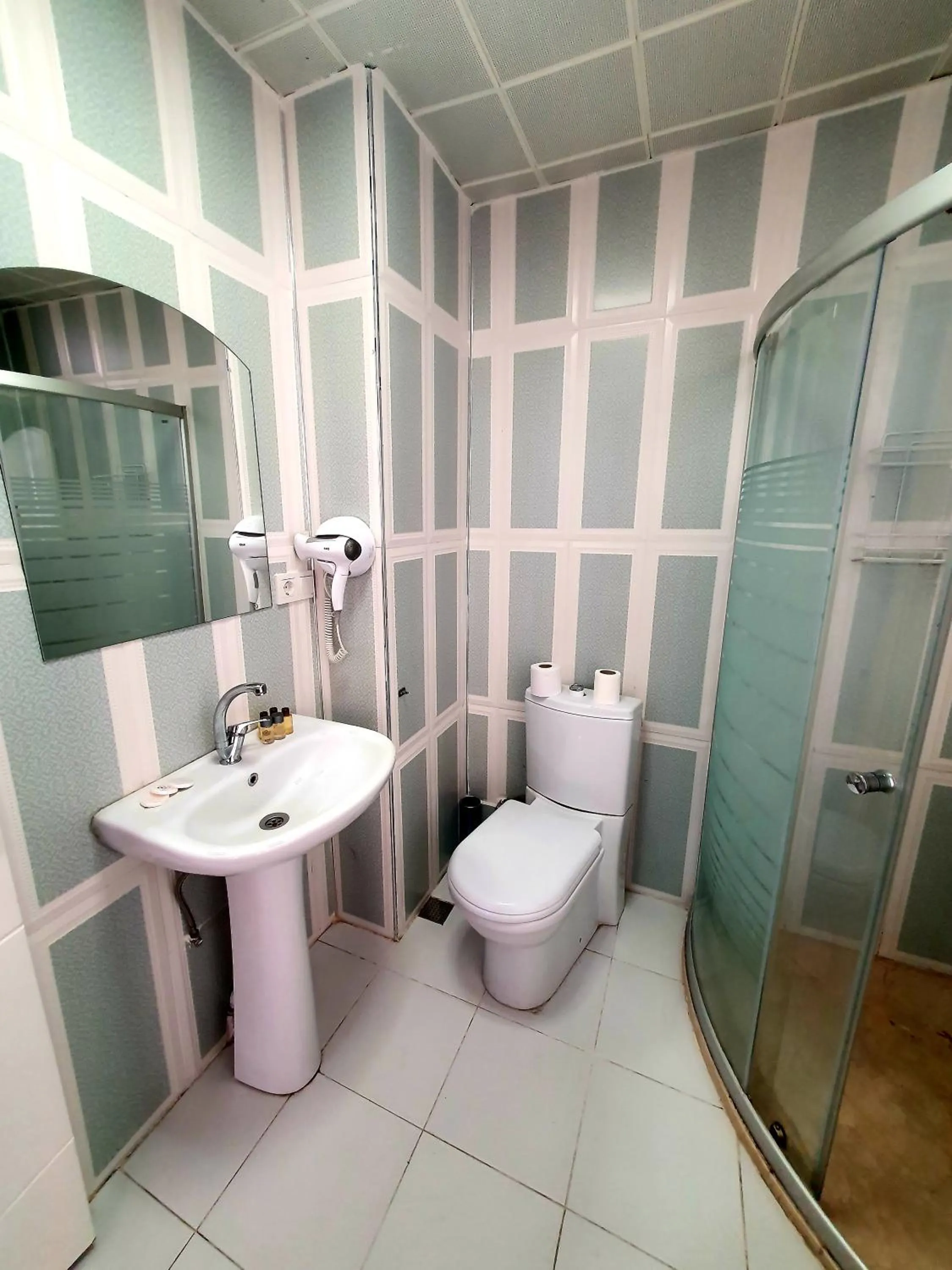 Bathroom in Omega Luxx Hotel