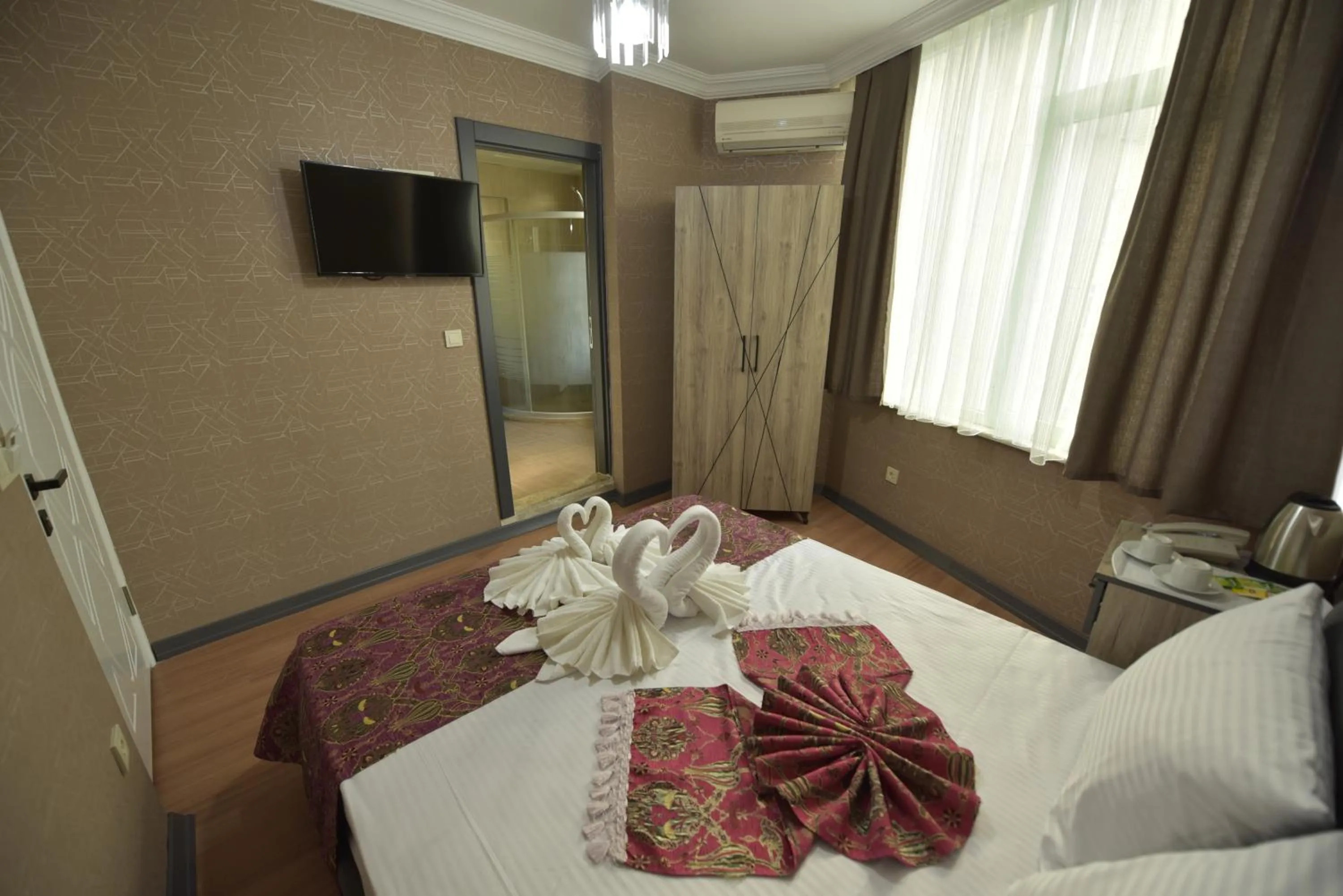 People, Bed in Omega Luxx Hotel