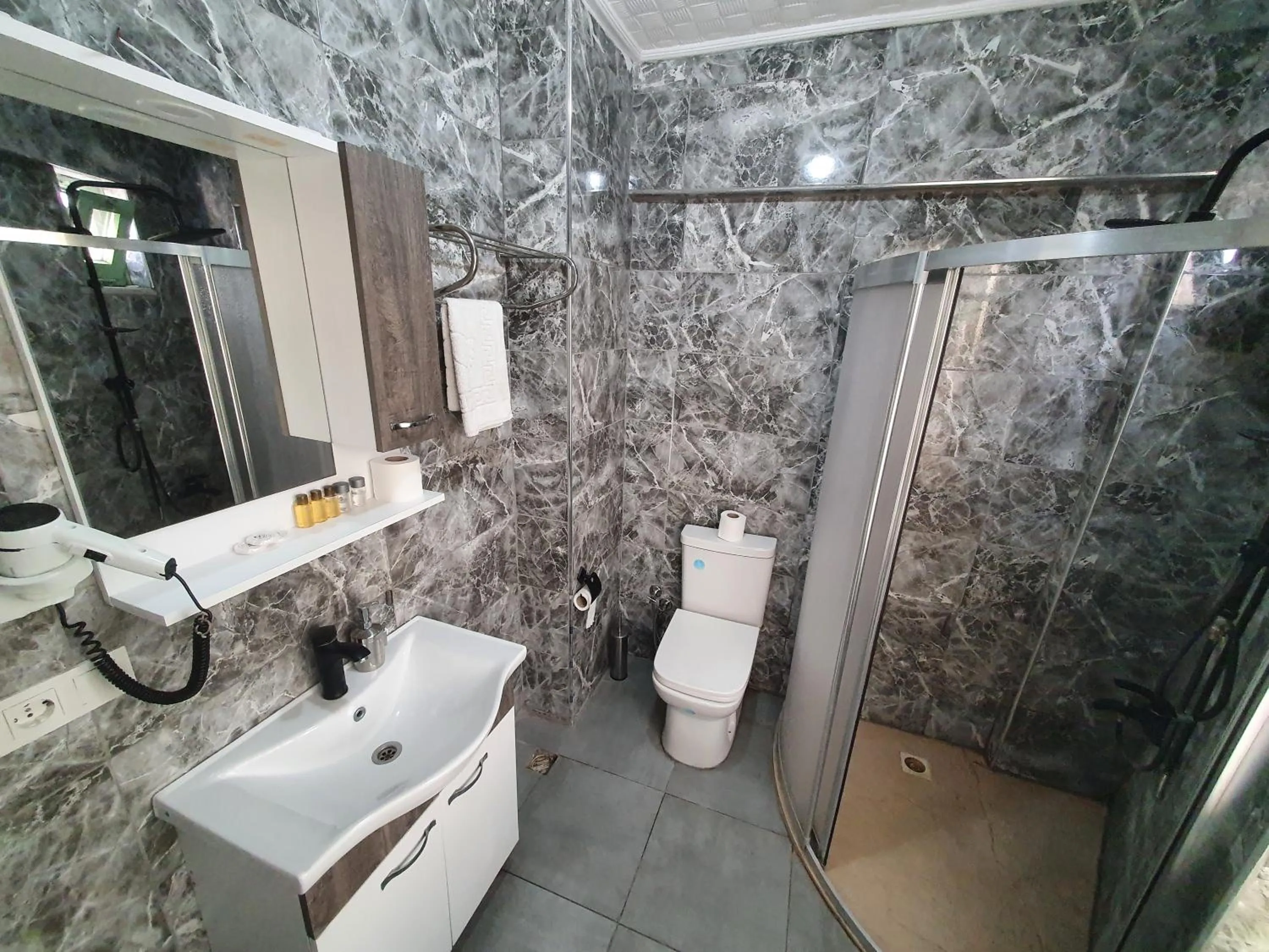 Bathroom in Omega Luxx Hotel