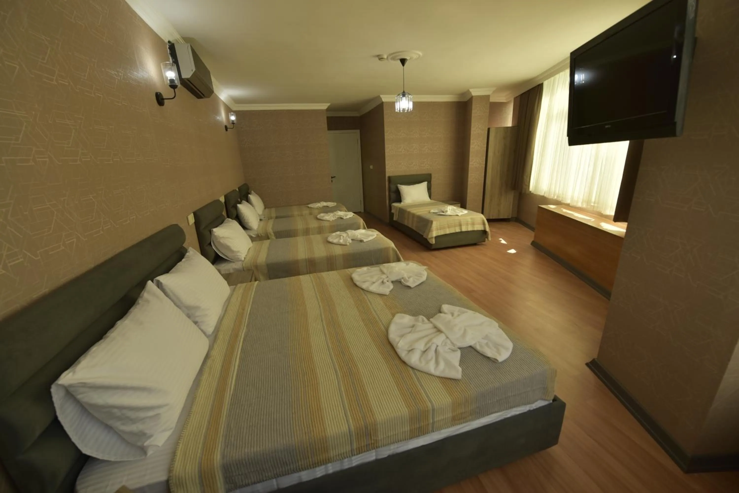 TV and multimedia, Bed in Omega Luxx Hotel