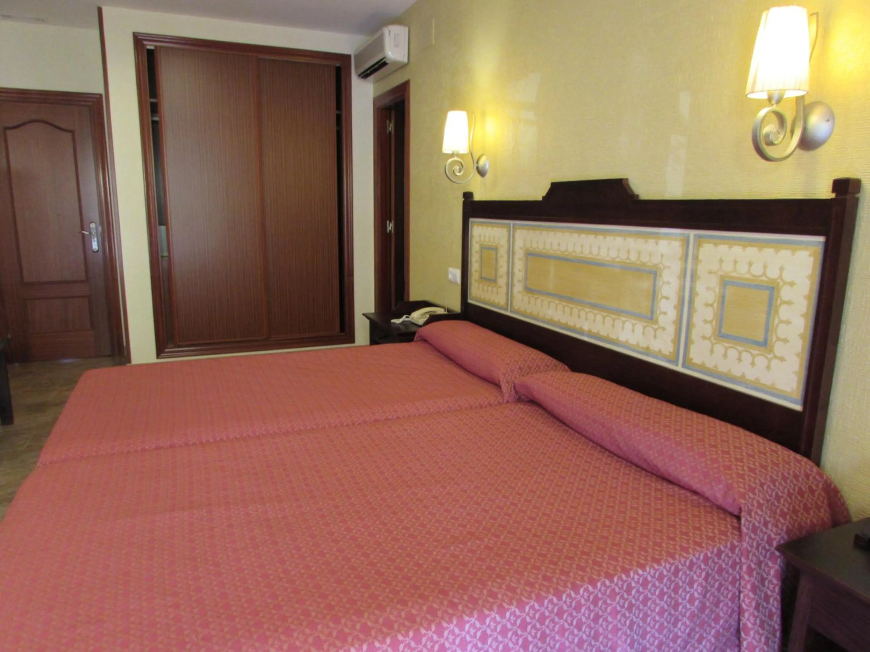 Bed in PARAISO PLAYA Hotel