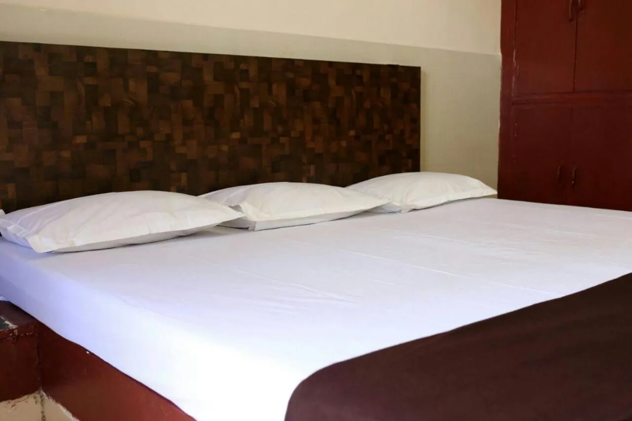 Bed in Travo Suites Panjim