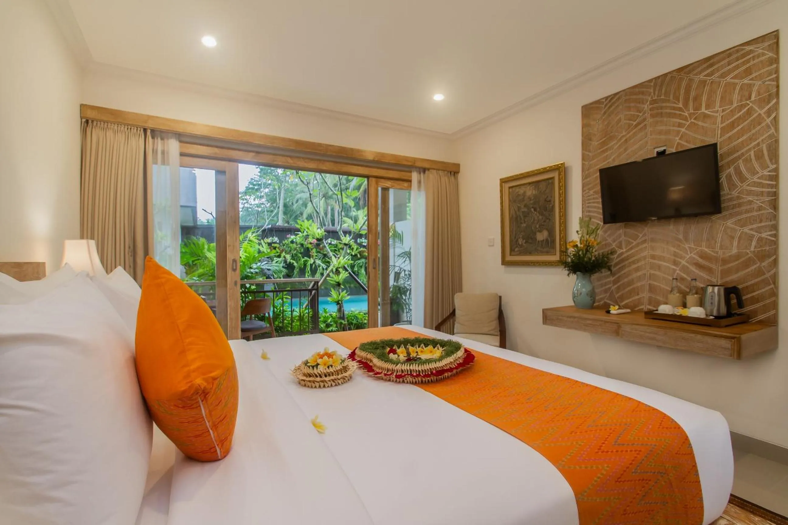 TV and multimedia, Bed in Tri Dewi Residence by GenuineHost