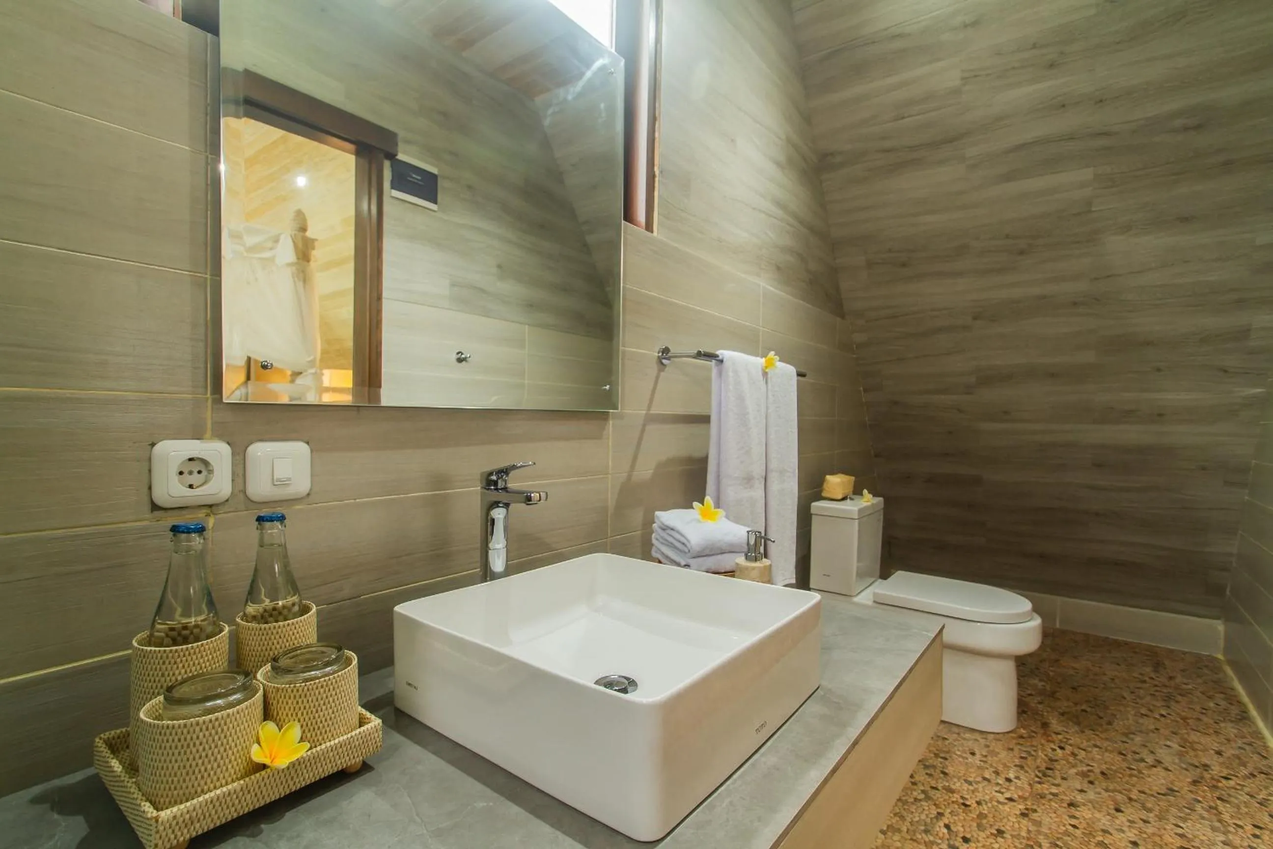 Bathroom in Tri Dewi Residence by GenuineHost