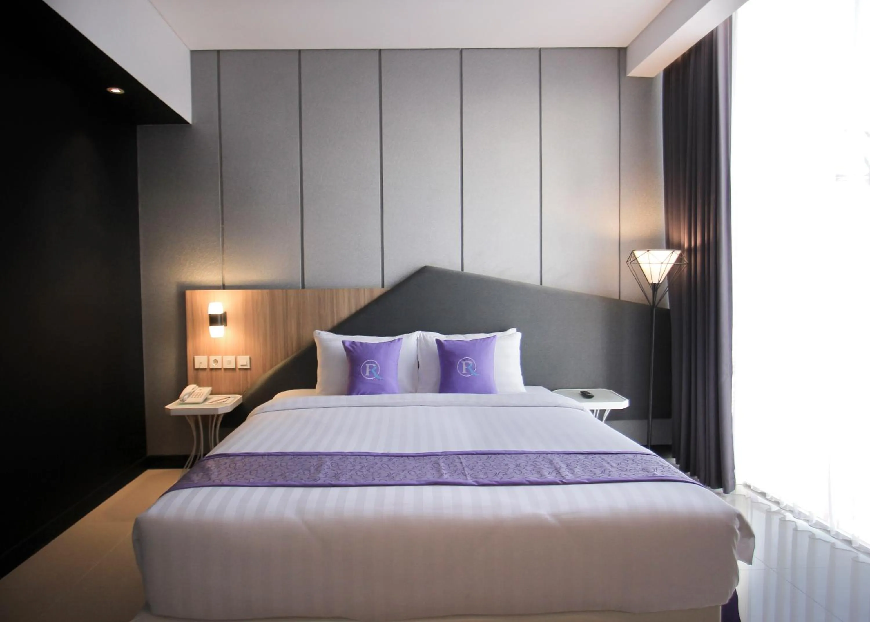 Bed in Forriz Hotel Yogyakarta