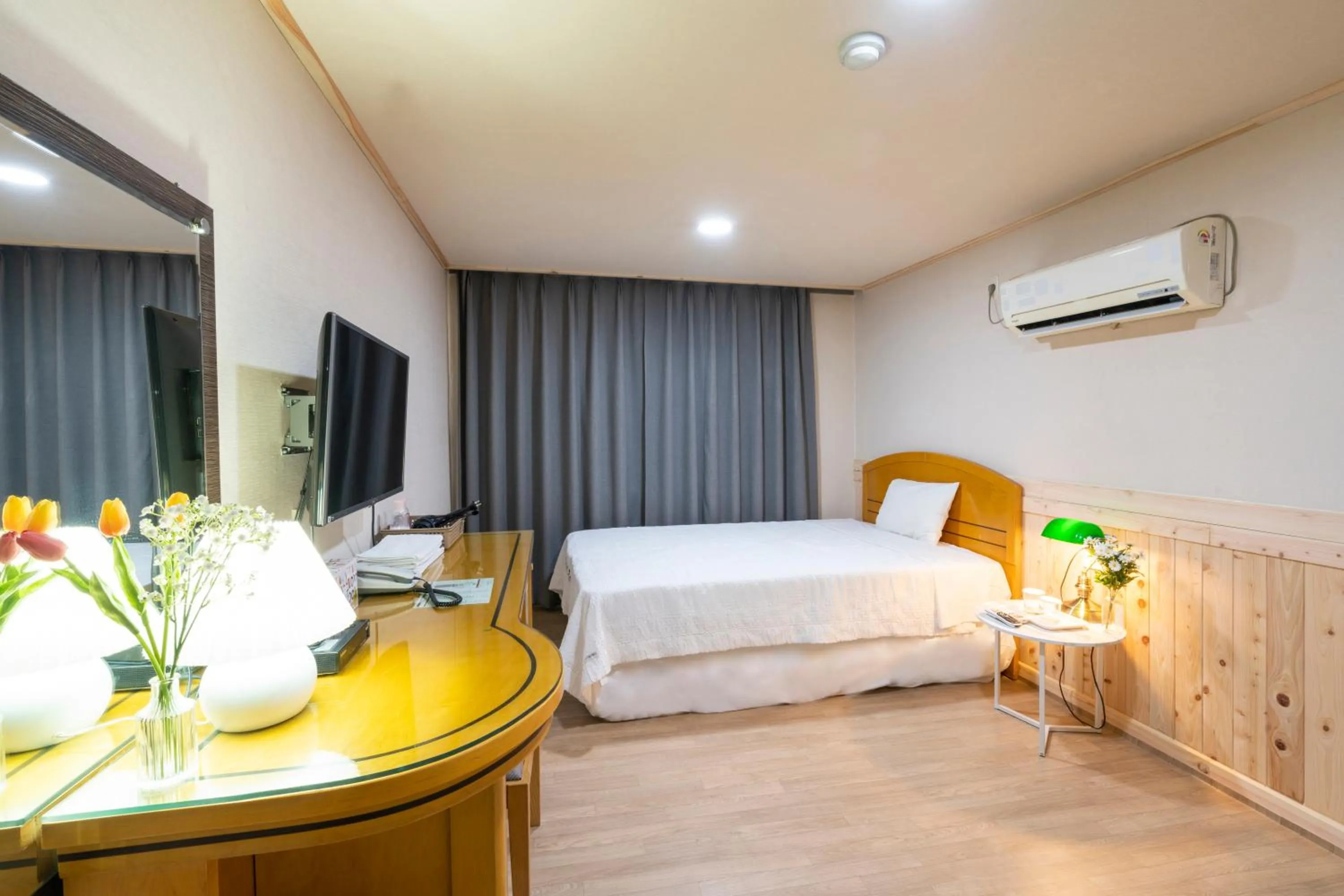 Bed in New Jeju Hotel