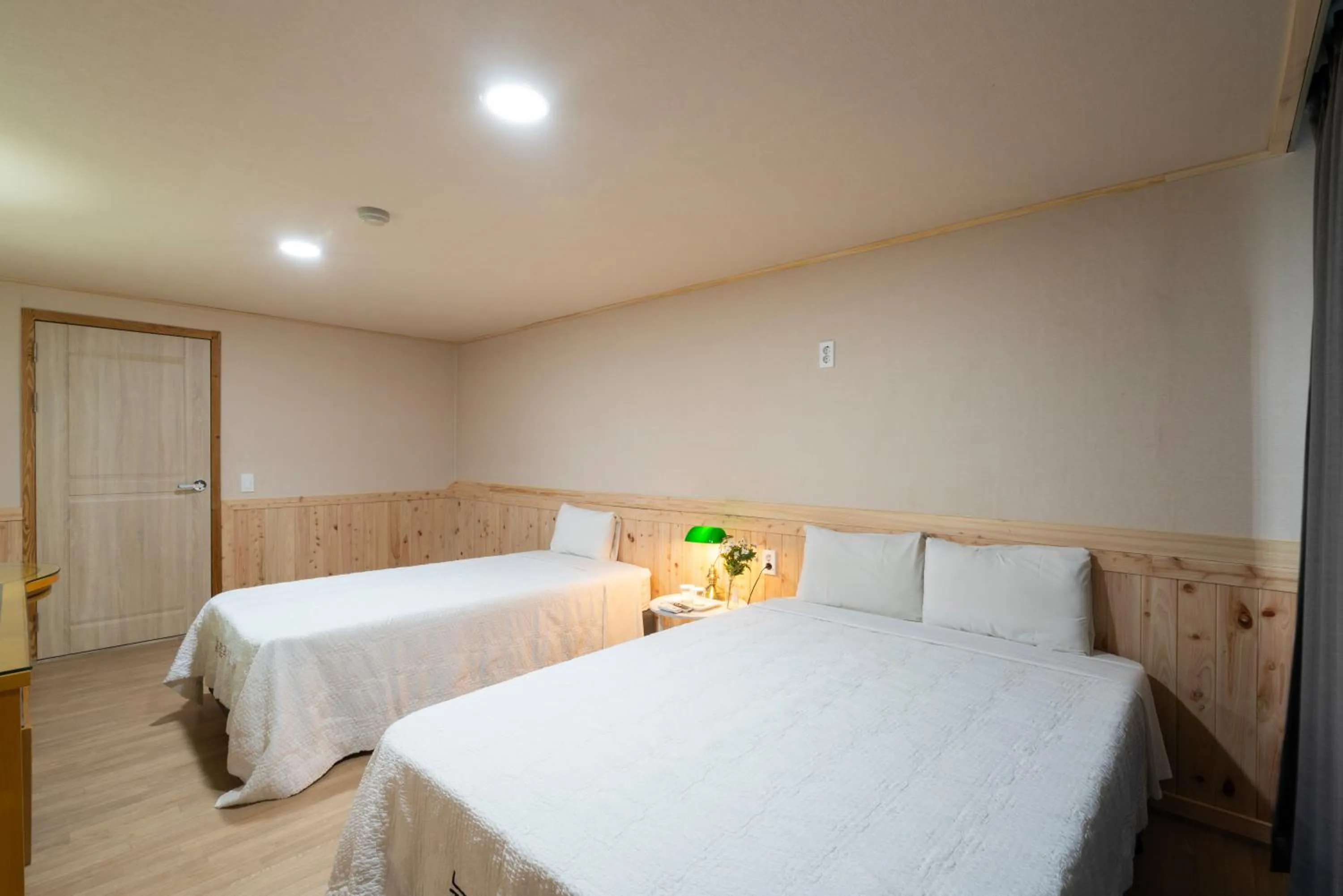 Bed in New Jeju Hotel