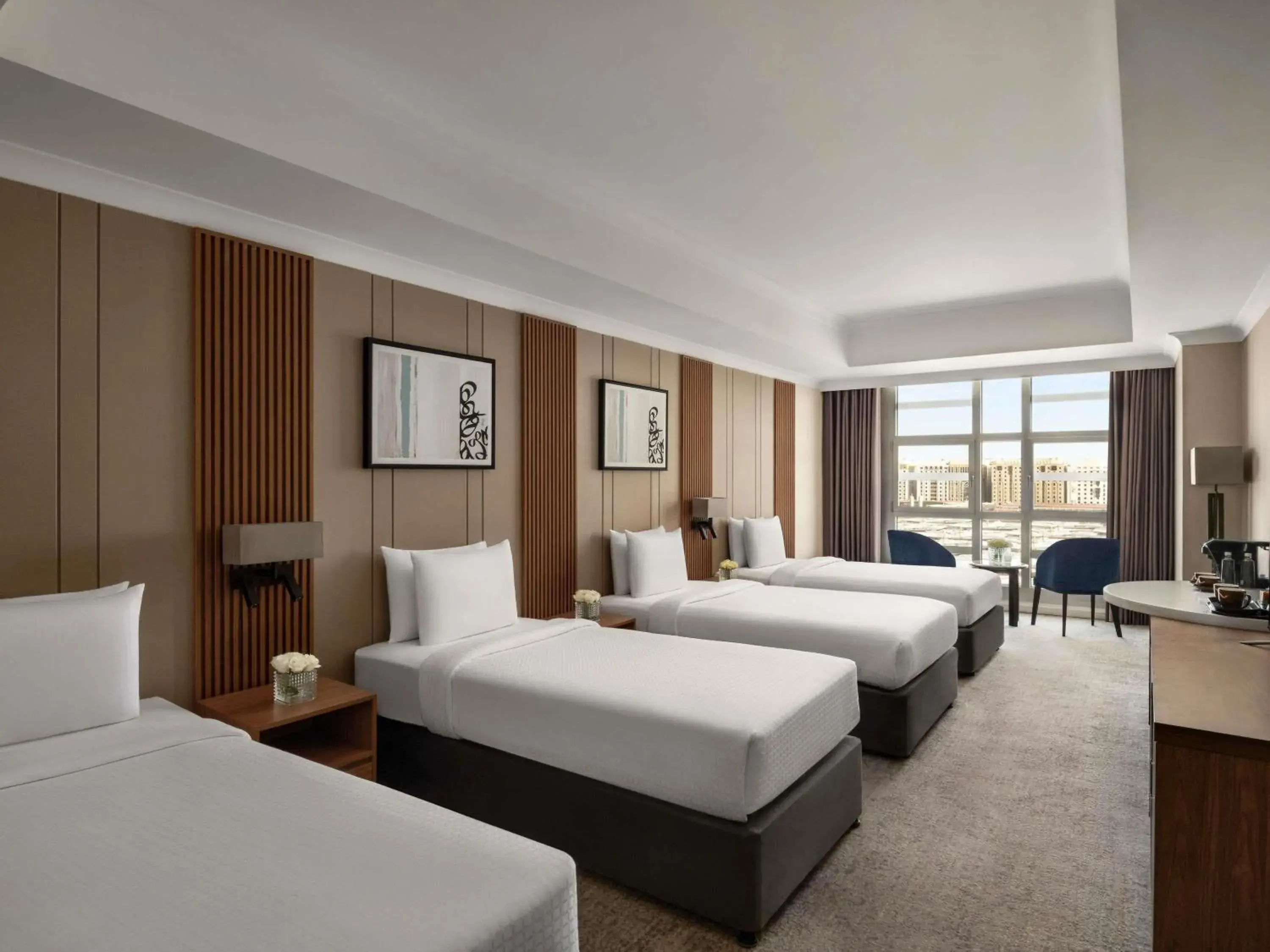 Deluxe Quadruple Room with Haram View in Anwar Al Madinah Mövenpick Deluxe Quadruple Room with Haram View in Anwar Al Madinah Mövenpick