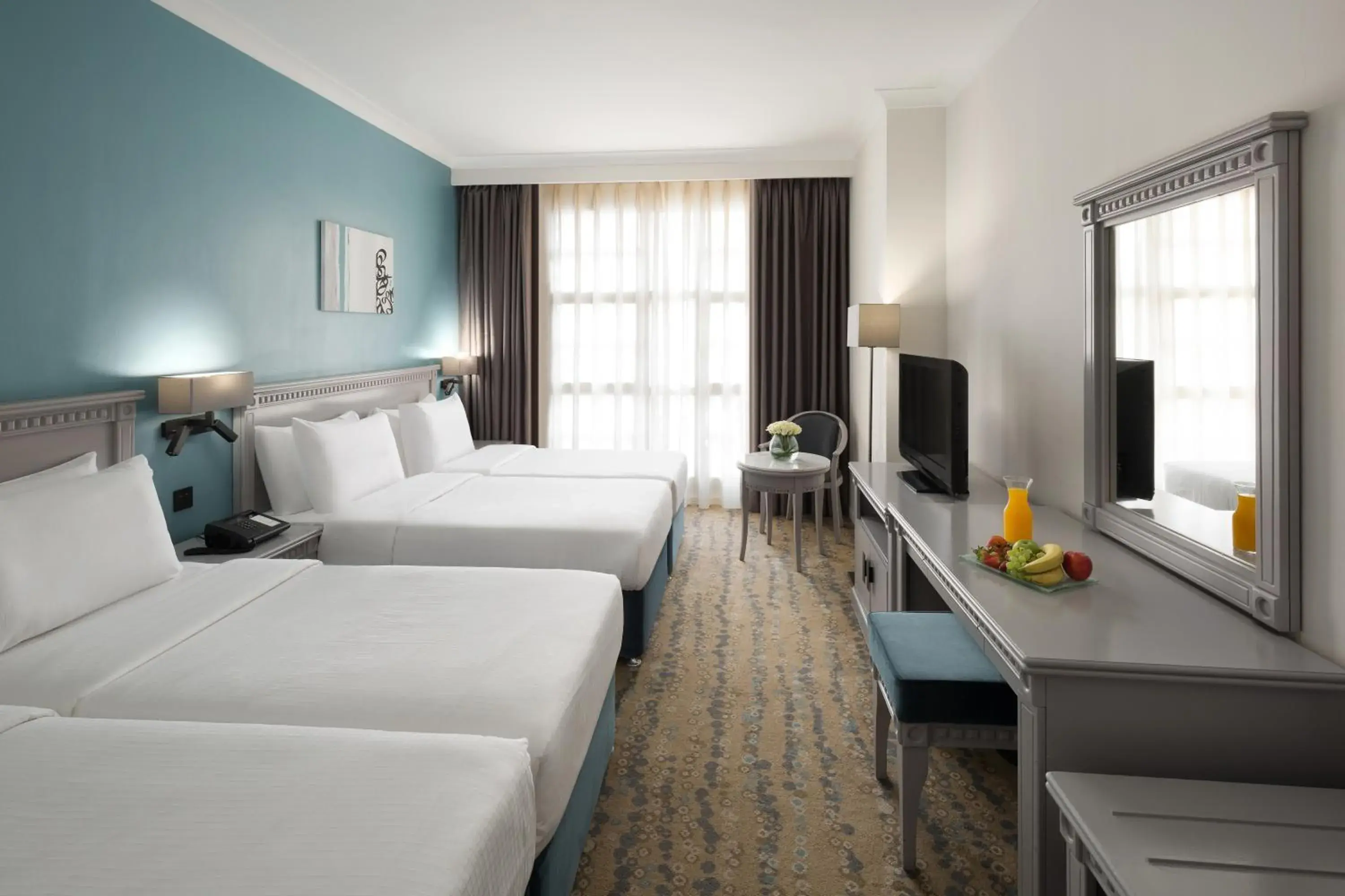 Classic Quadruple Room in Anwar Al Madinah Mövenpick Classic Quadruple Room in Anwar Al Madinah Mövenpick