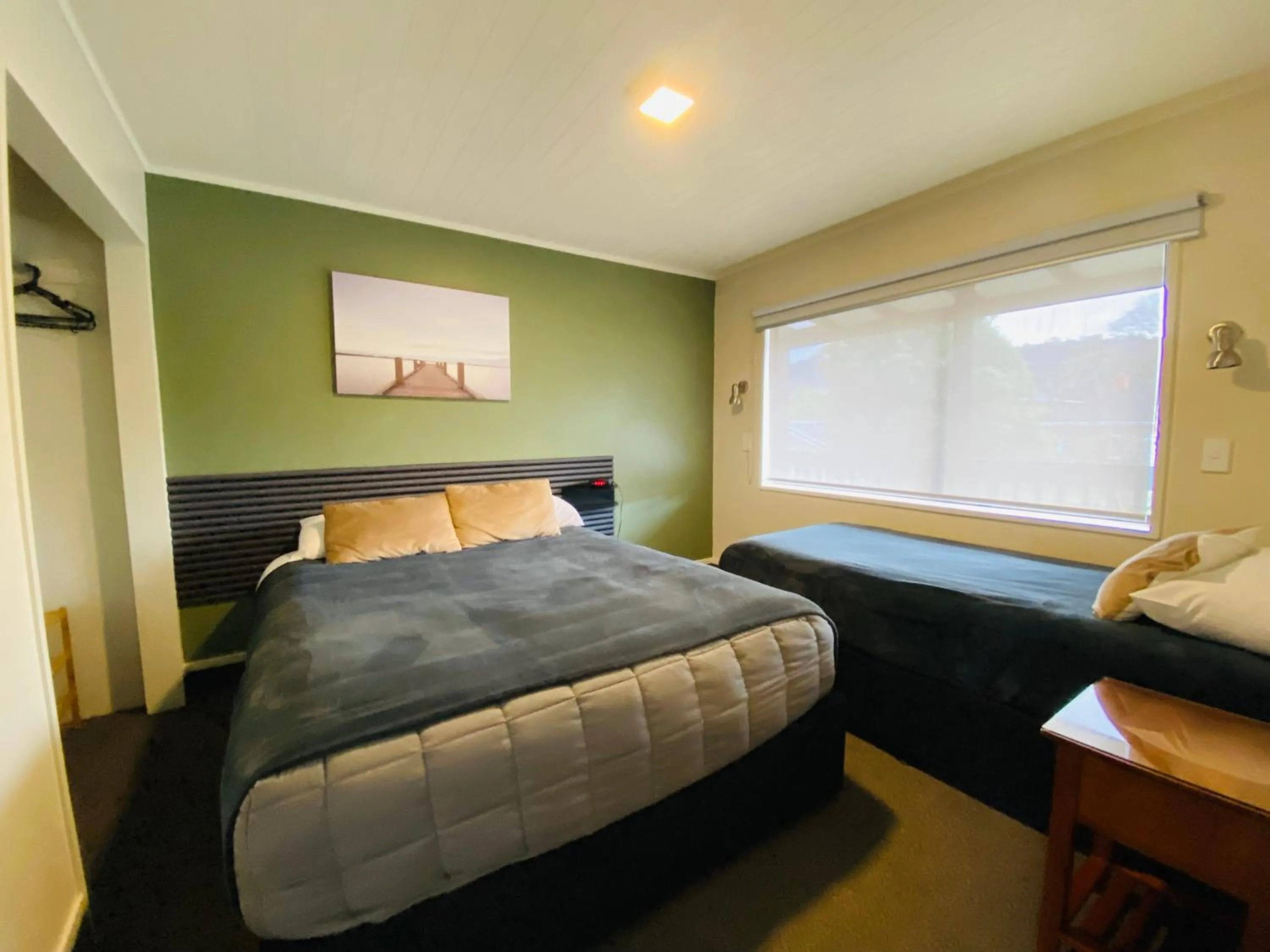 Bed in Commodore Motel