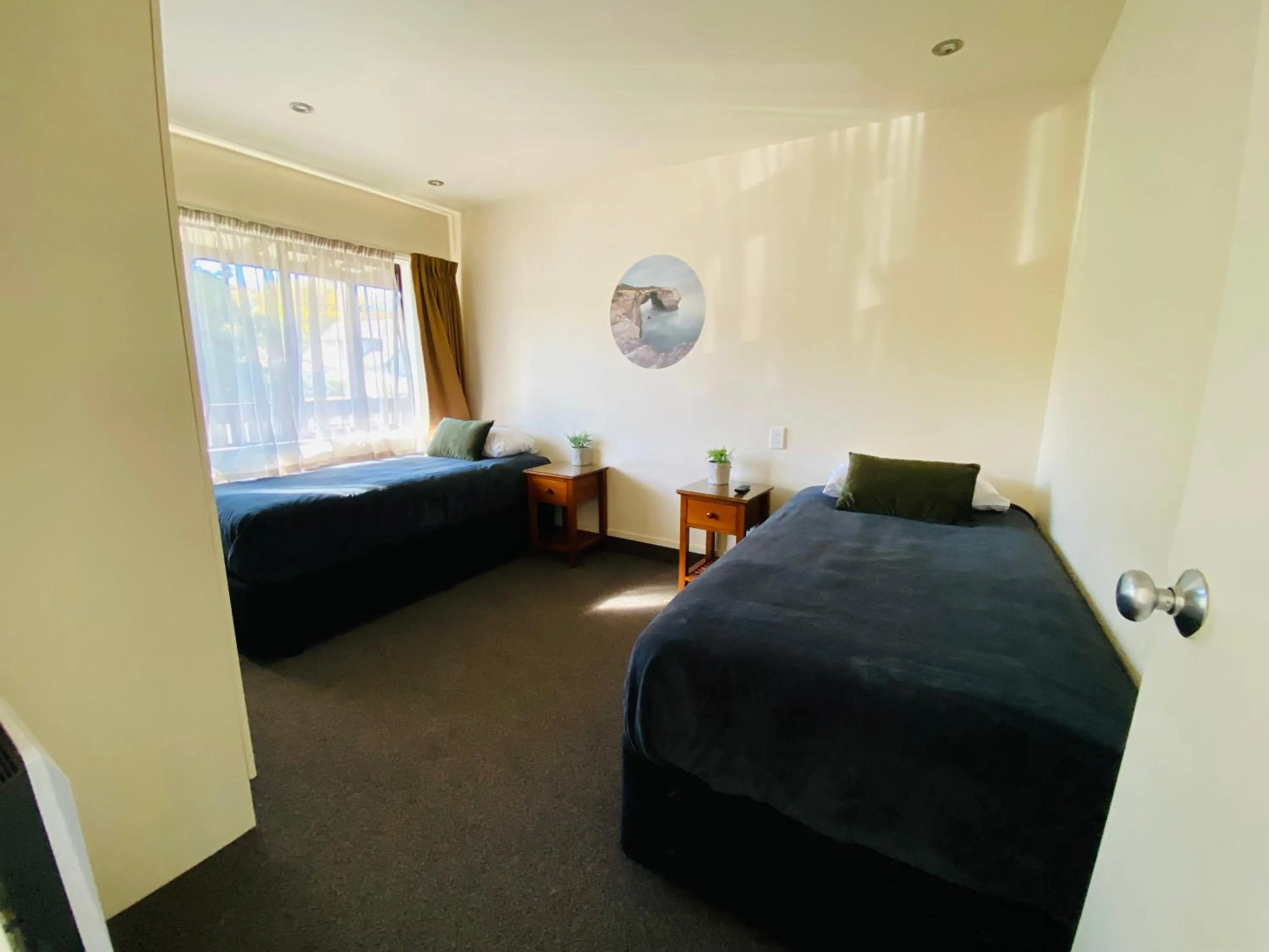 Bed in Commodore Motel