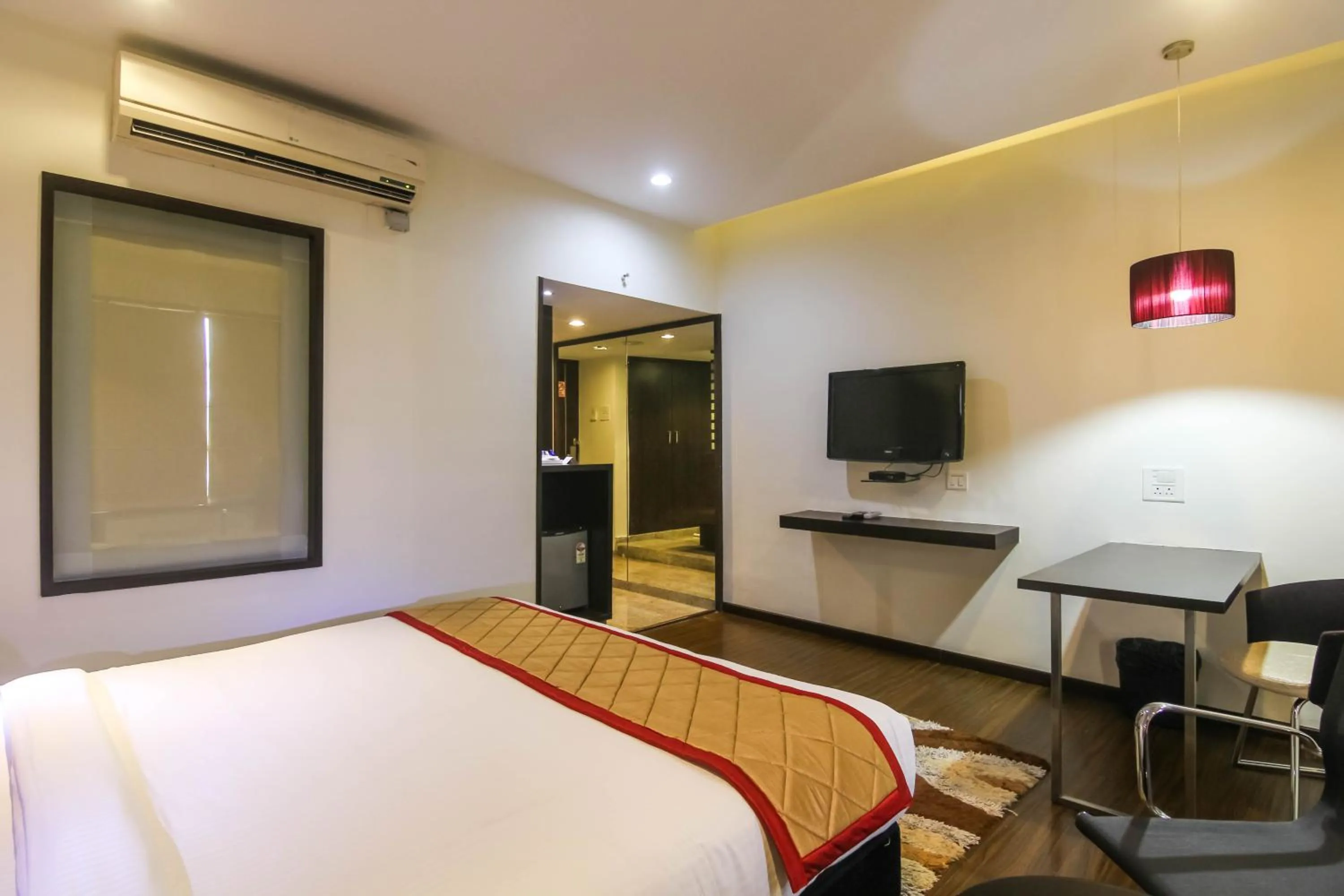 Bedroom in Hotel LXIA Hinjewadi - Indian Nationals Only