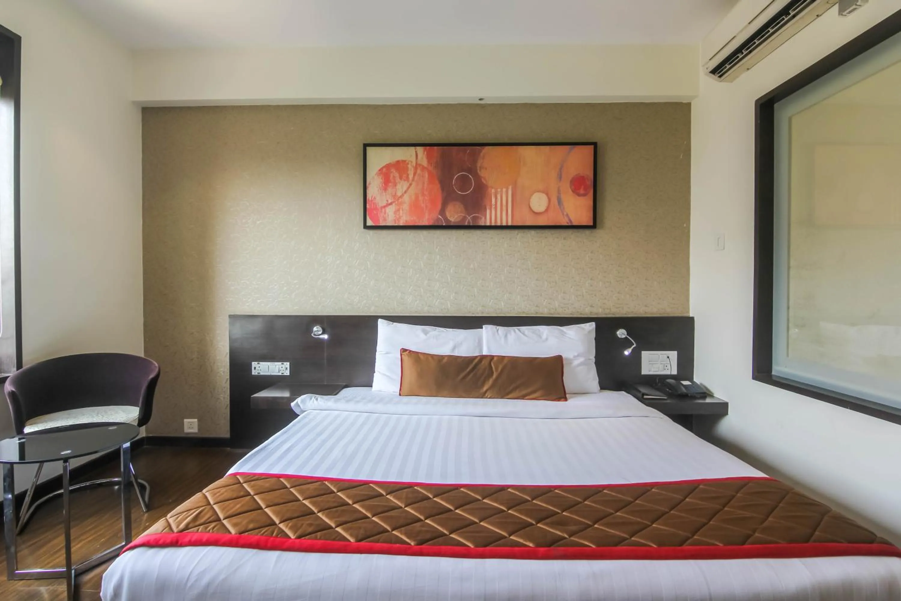 Bedroom in Hotel LXIA Hinjewadi - Indian Nationals Only