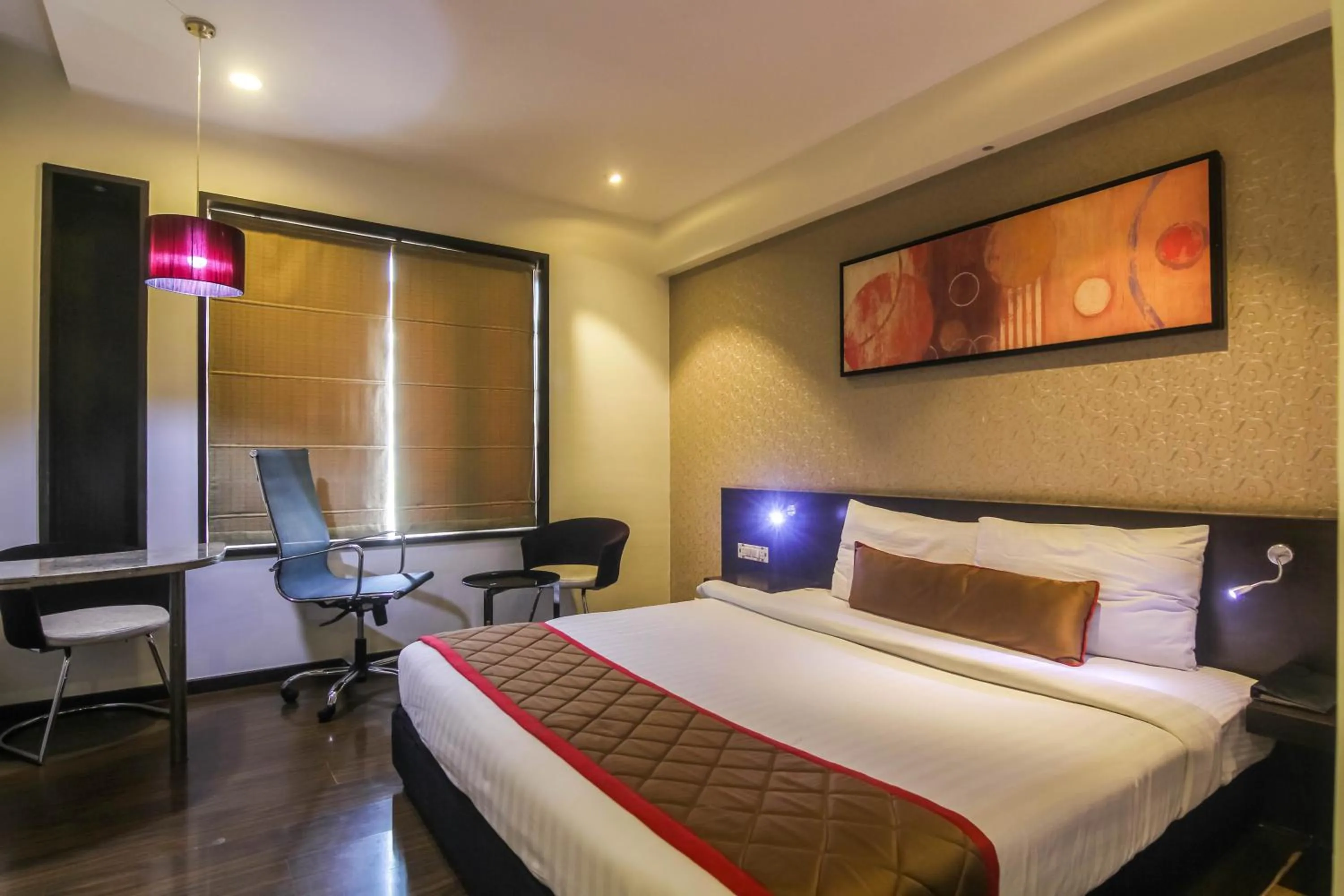 Bedroom in Hotel LXIA Hinjewadi - Indian Nationals Only