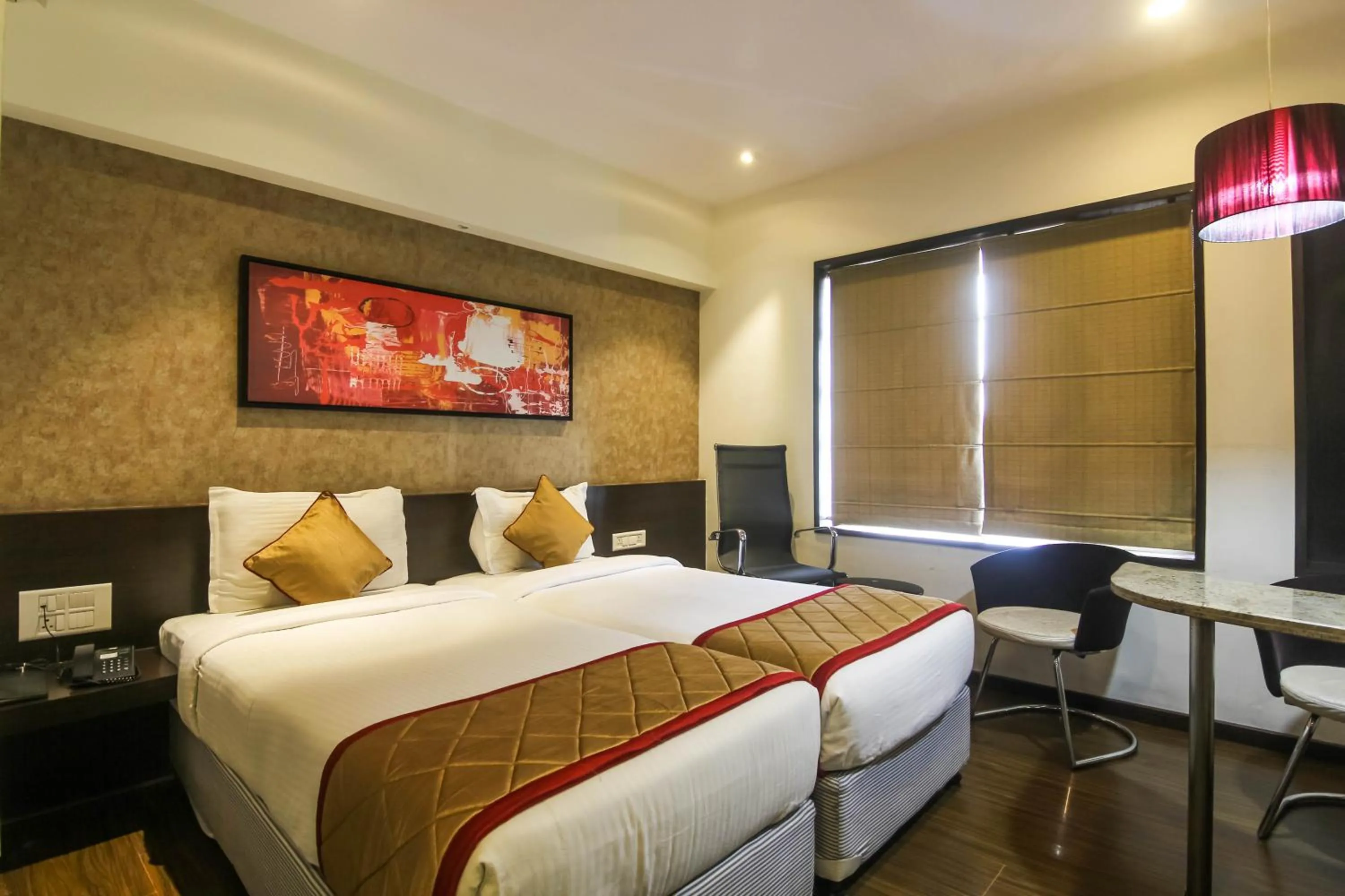 Bedroom in Hotel LXIA Hinjewadi - Indian Nationals Only