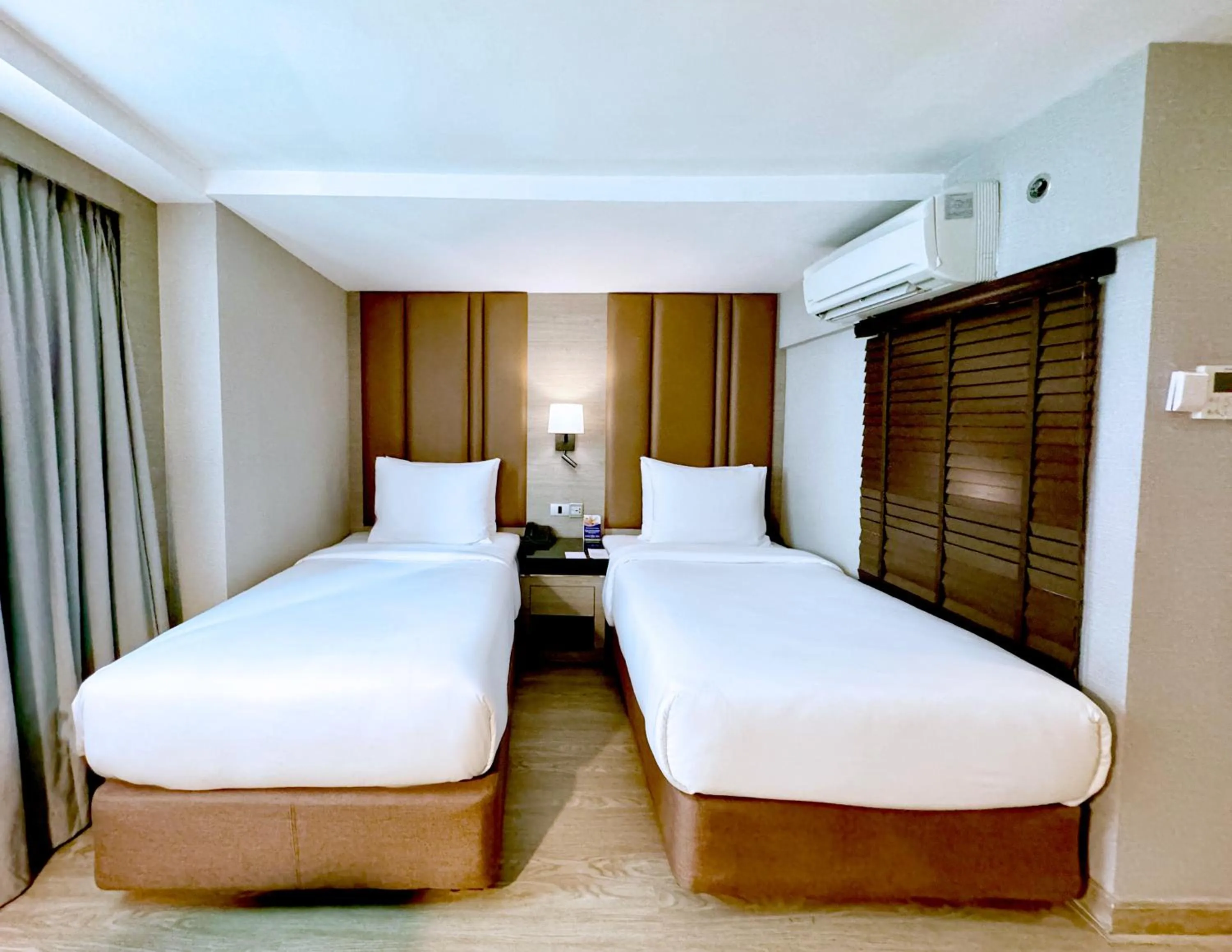 Bed in Ramada Sukhumvit Soi Eleven