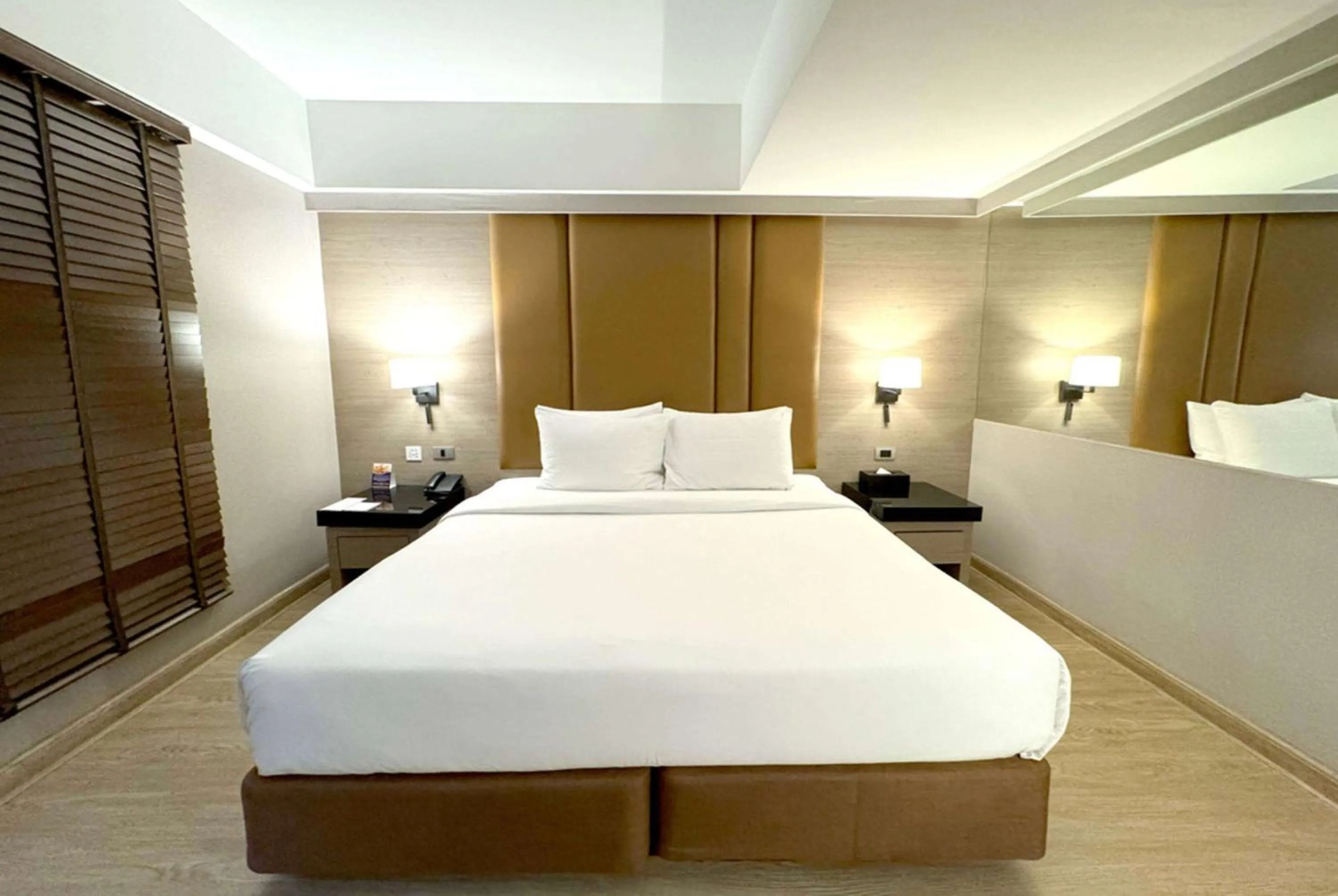 Photo of the whole room, Bed in Ramada Sukhumvit Soi Eleven