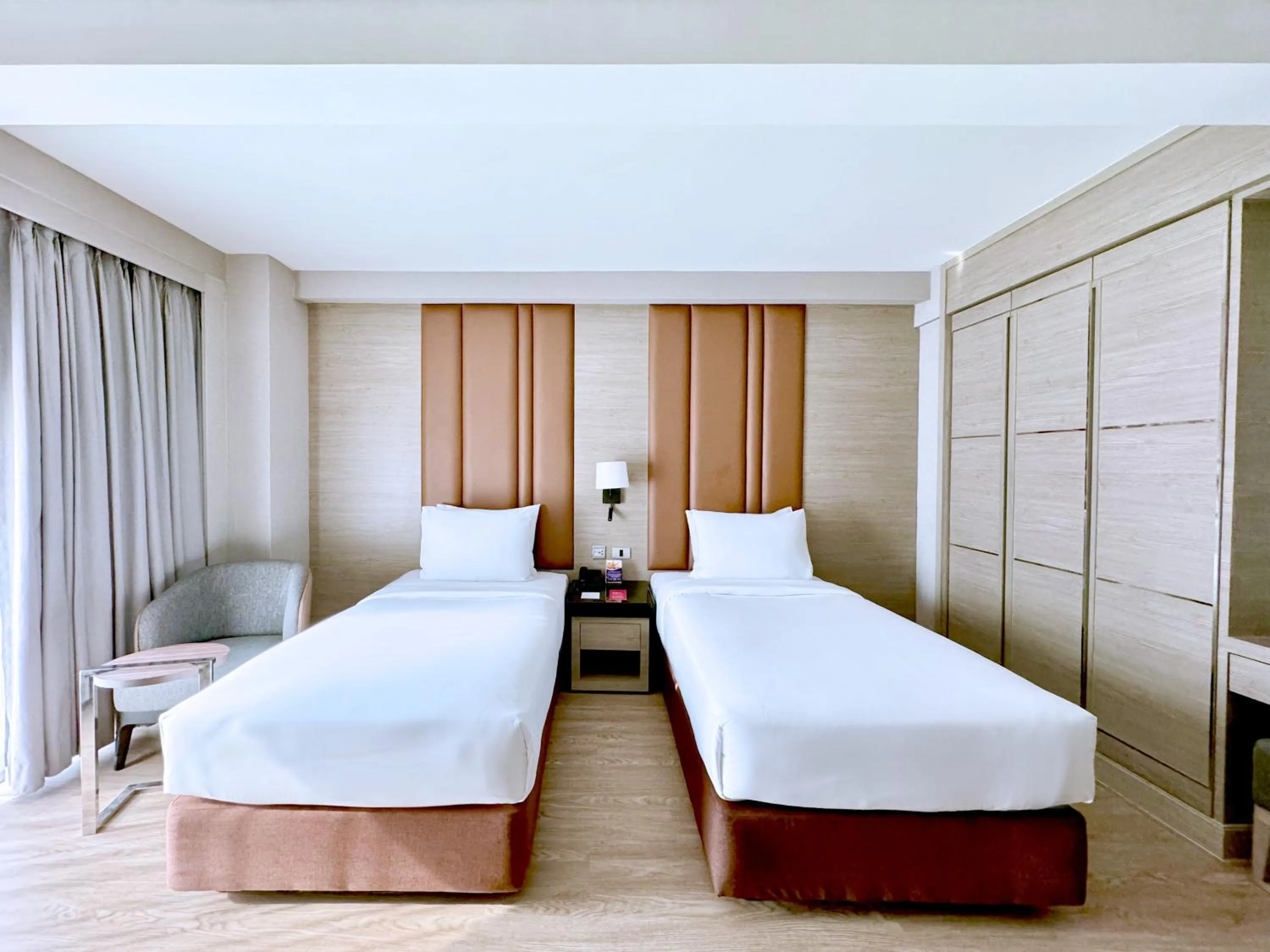 Bed in Ramada Sukhumvit Soi Eleven