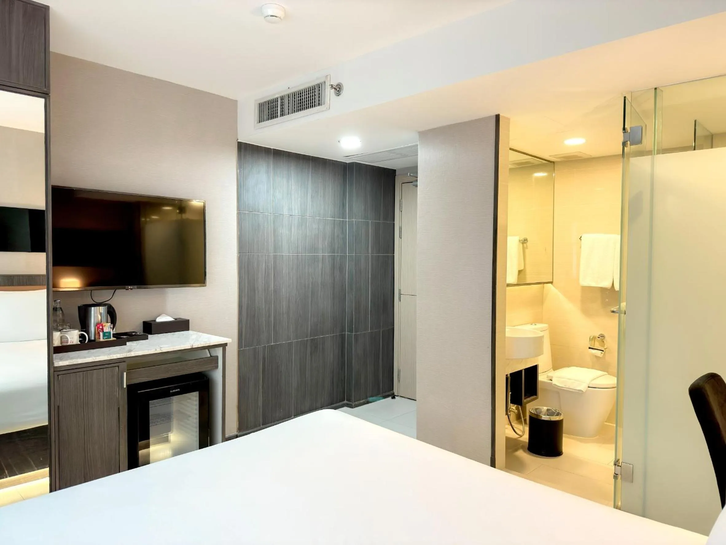 Bed in Ramada Sukhumvit Soi Eleven