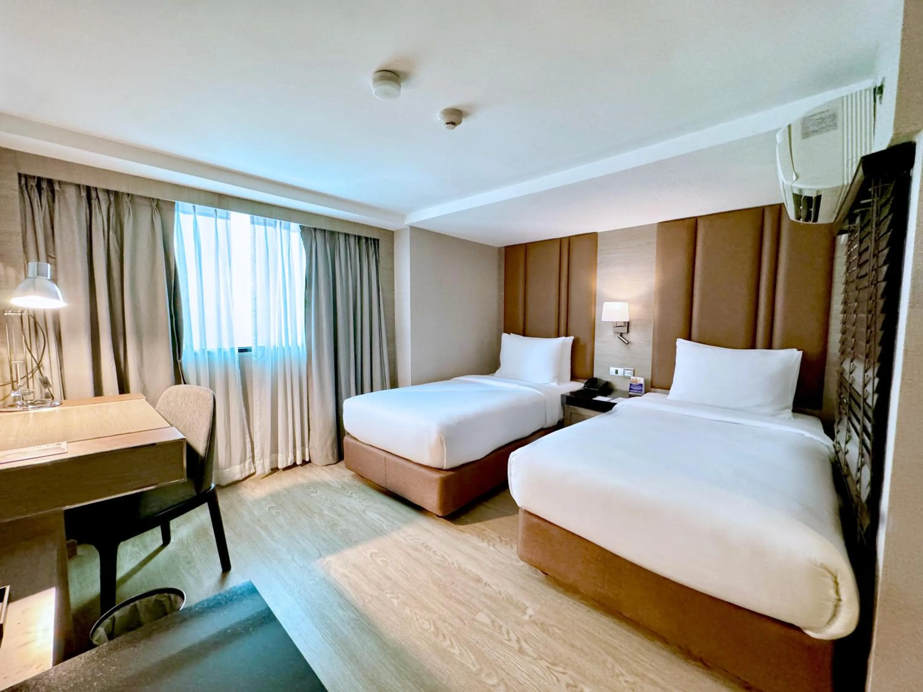 Bed in Ramada Sukhumvit Soi Eleven