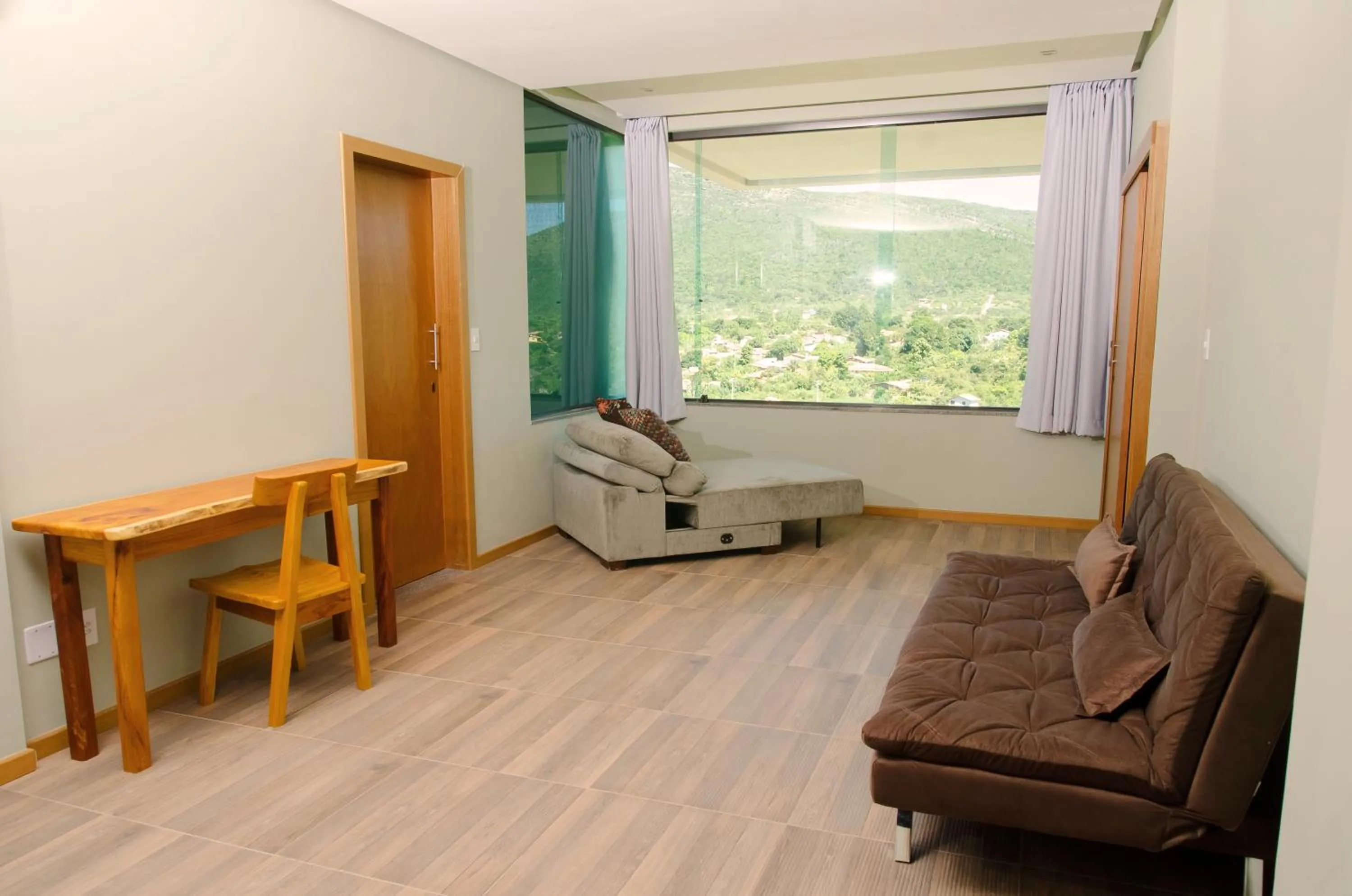 Communal lounge/ TV room in Pousada Vie