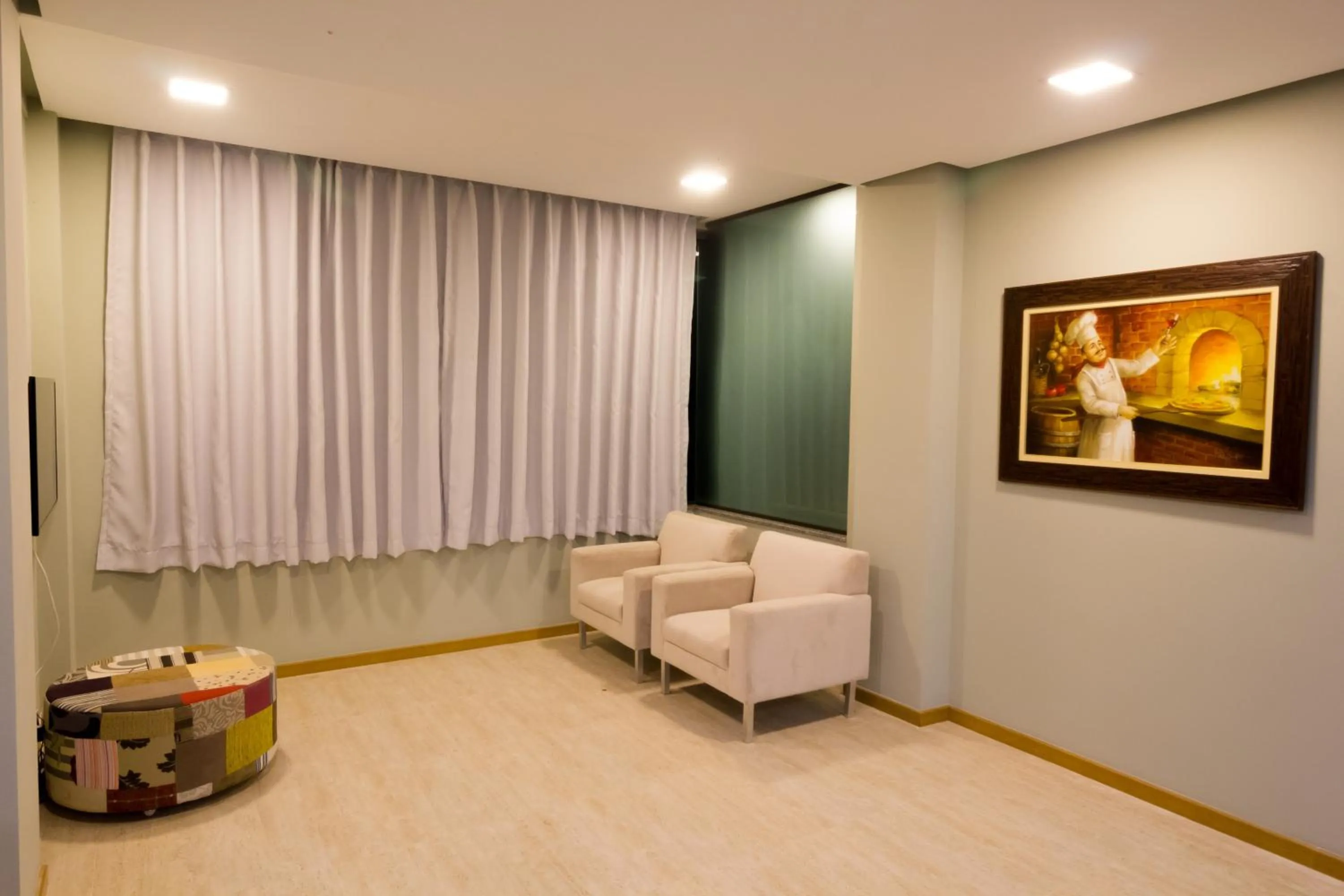 Communal lounge/ TV room in Pousada Vie