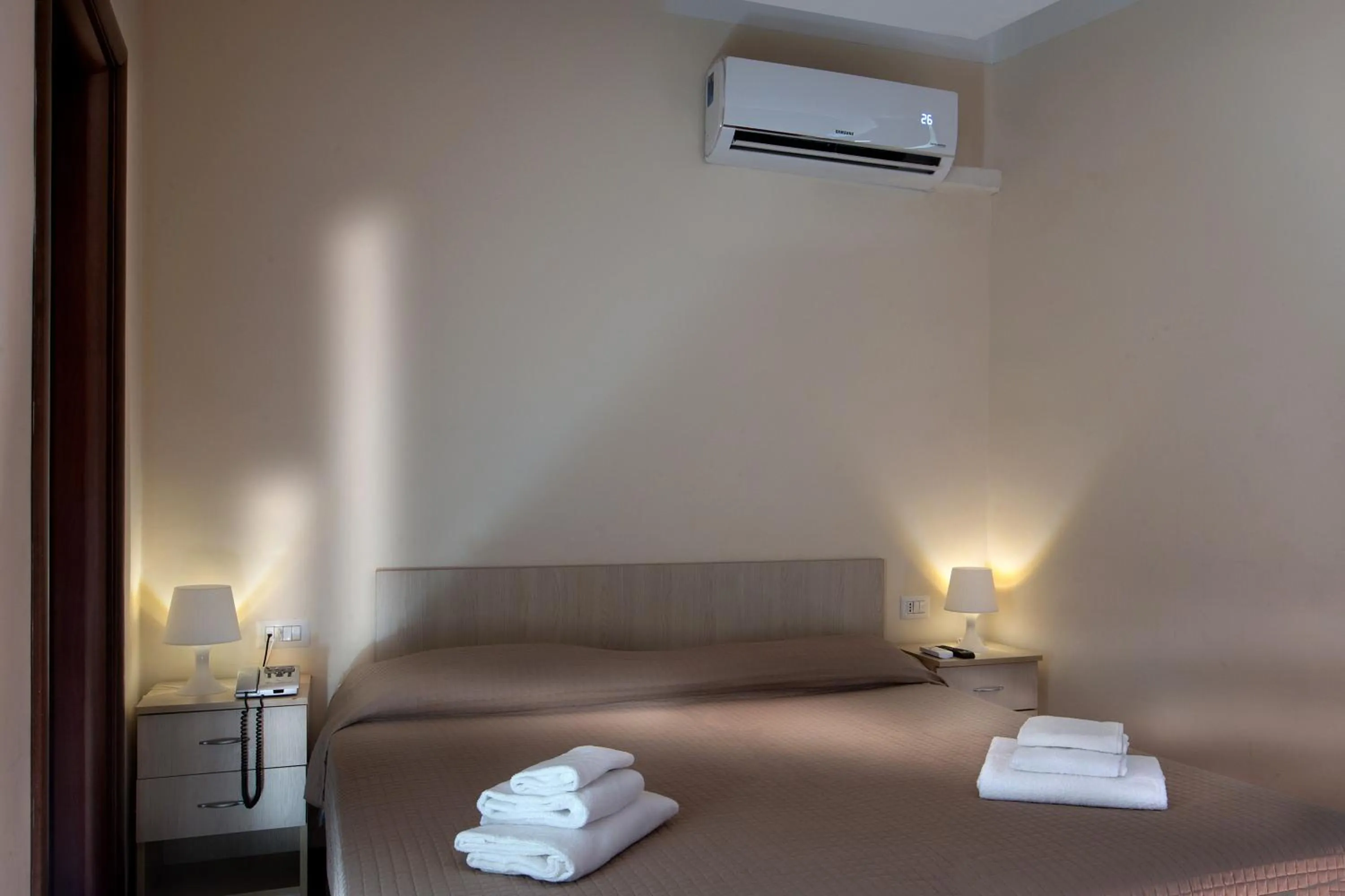 Bed in Hotel Diamond