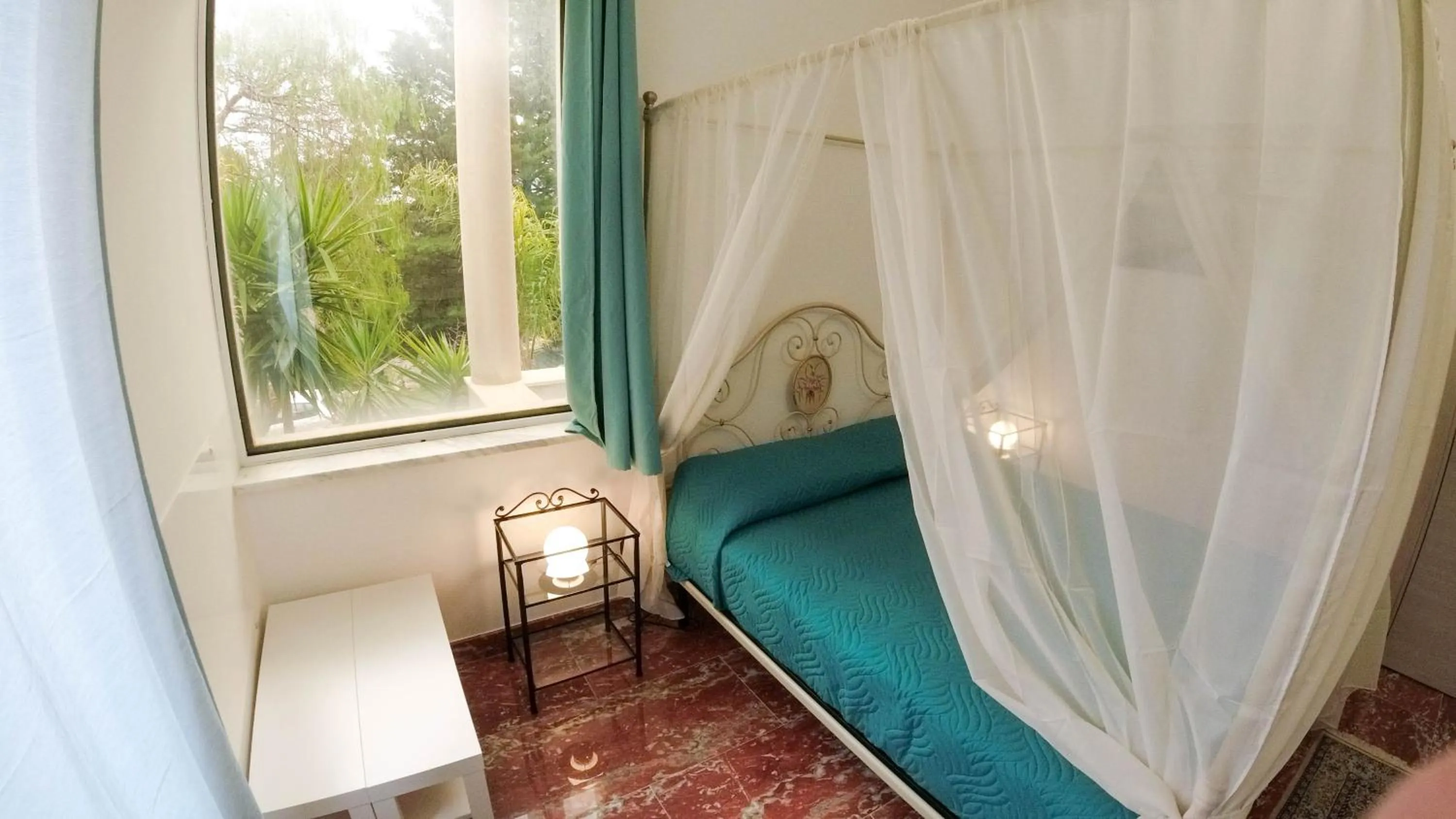 Bed in Il Piccolo Hotel