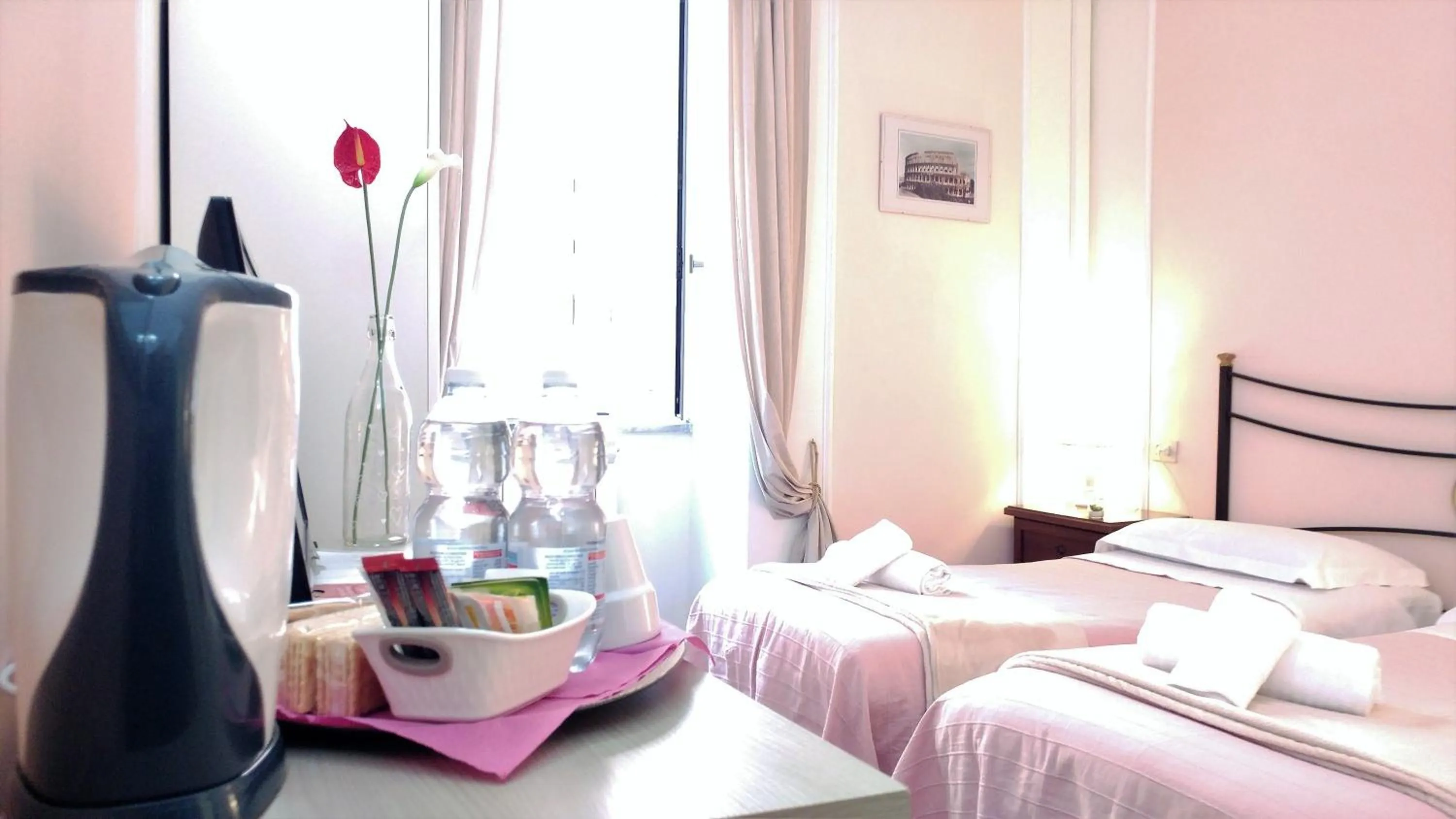 Decorative detail, Bed in Dreaming Navona Rooms