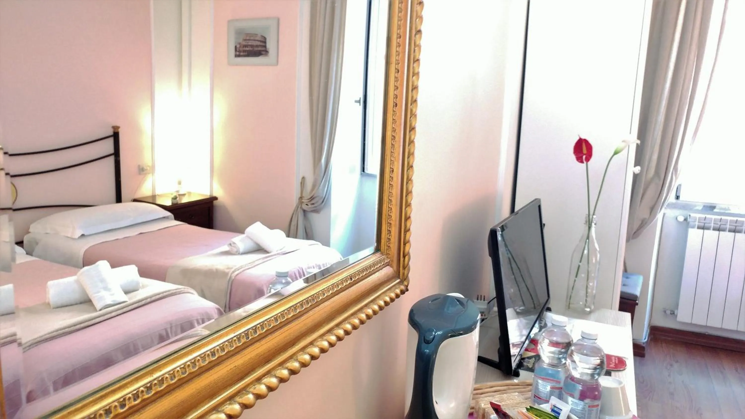 Decorative detail, Bed in Dreaming Navona Rooms