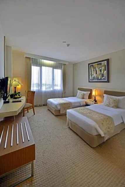 Photo of the whole room, Bed in Grand Serela Setiabudhi Bandung