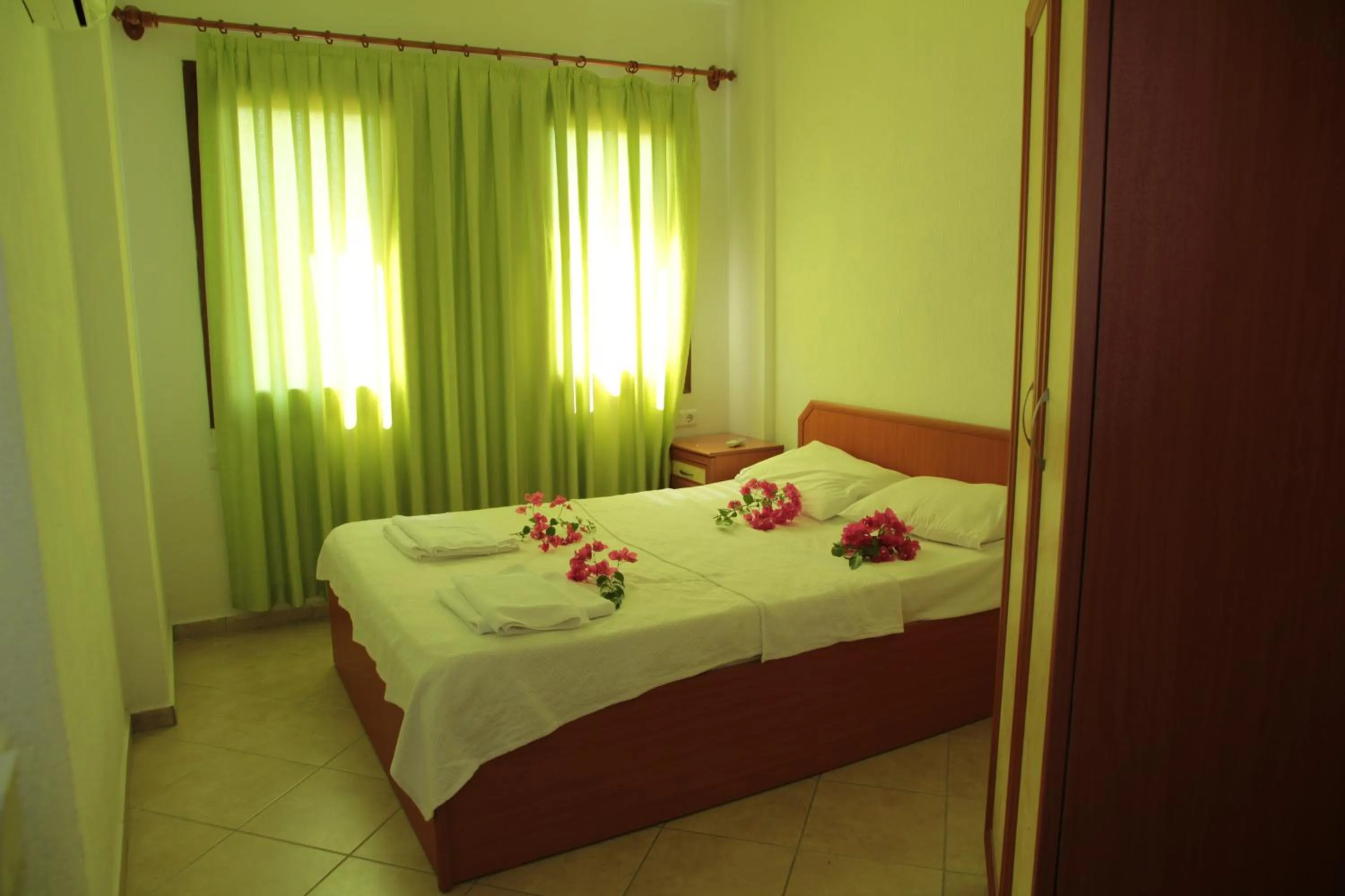 Bed in Minta Apartments