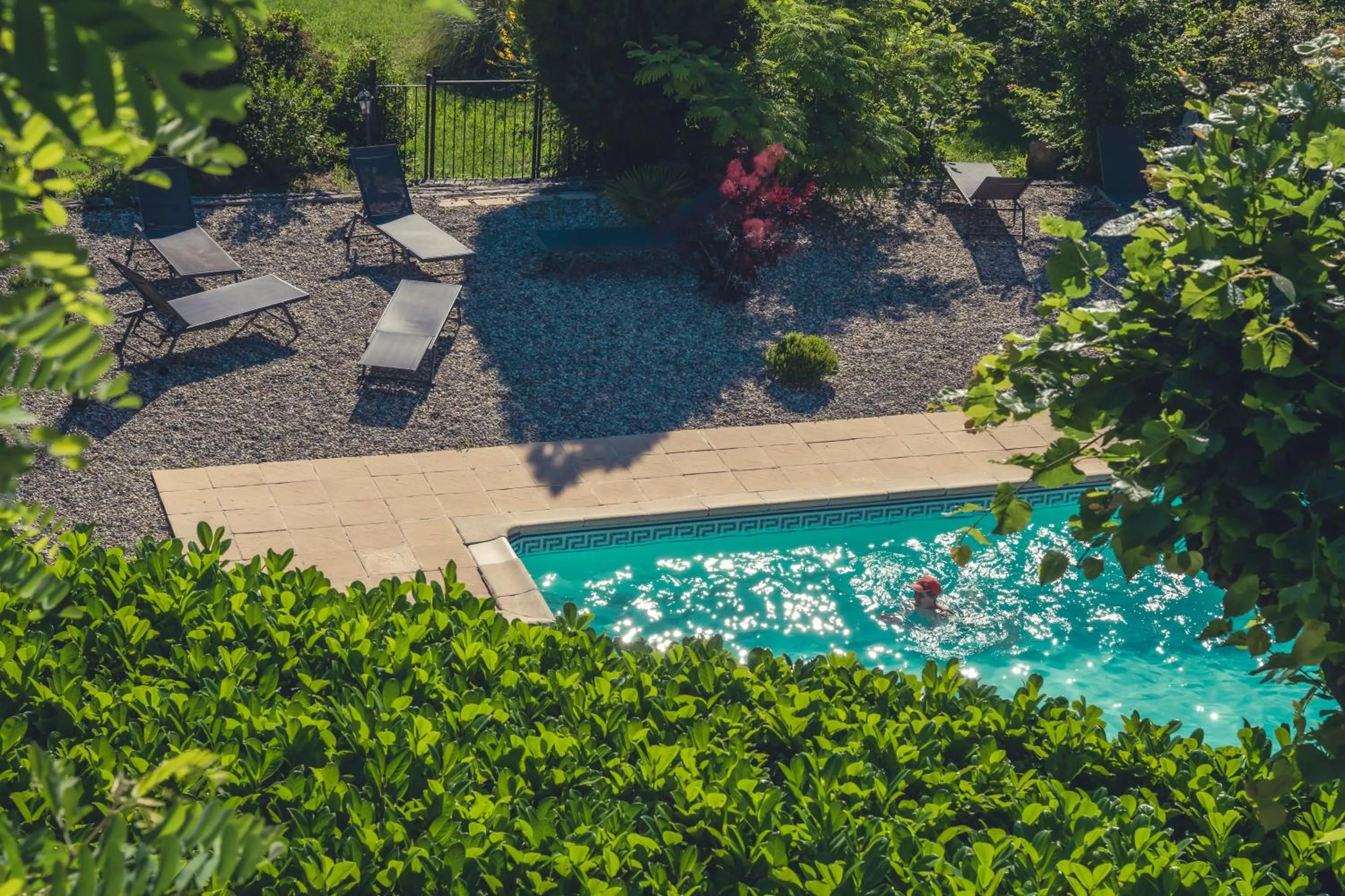 Swimming pool in Logis Hôtel Restaurant Le Plantevin
