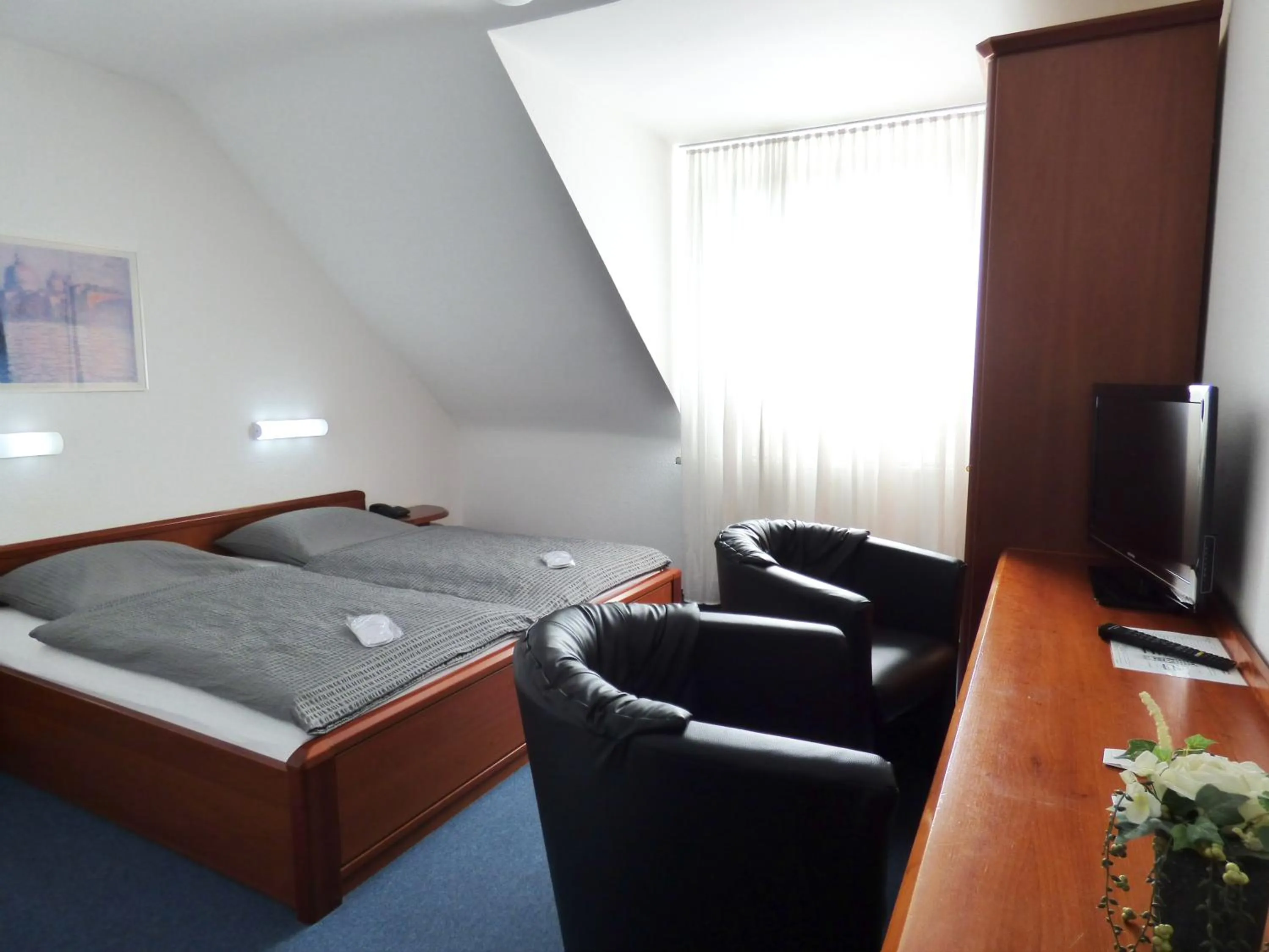 Photo of the whole room in Hotel Alt Büttgen