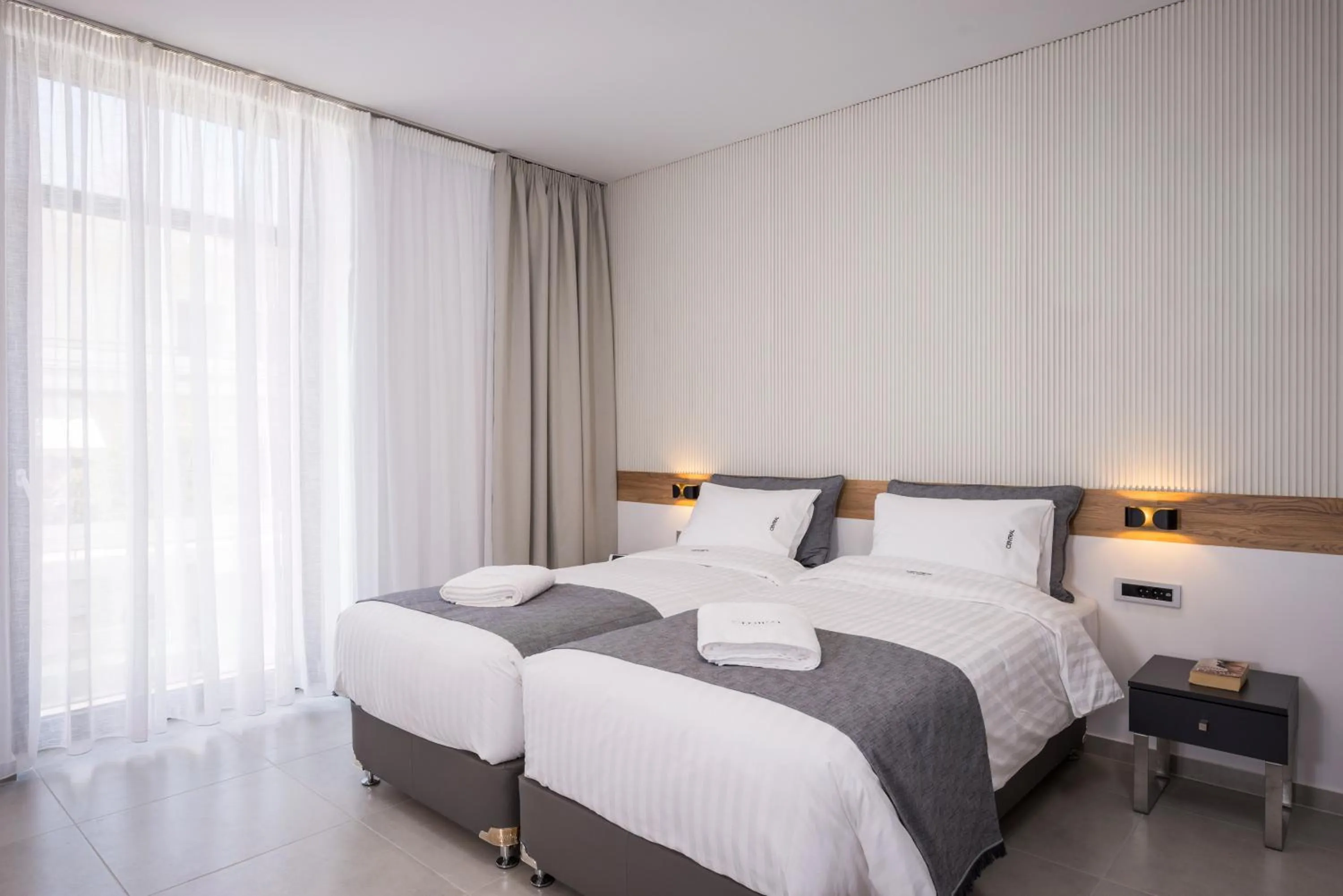 Bed in Central City Hotel