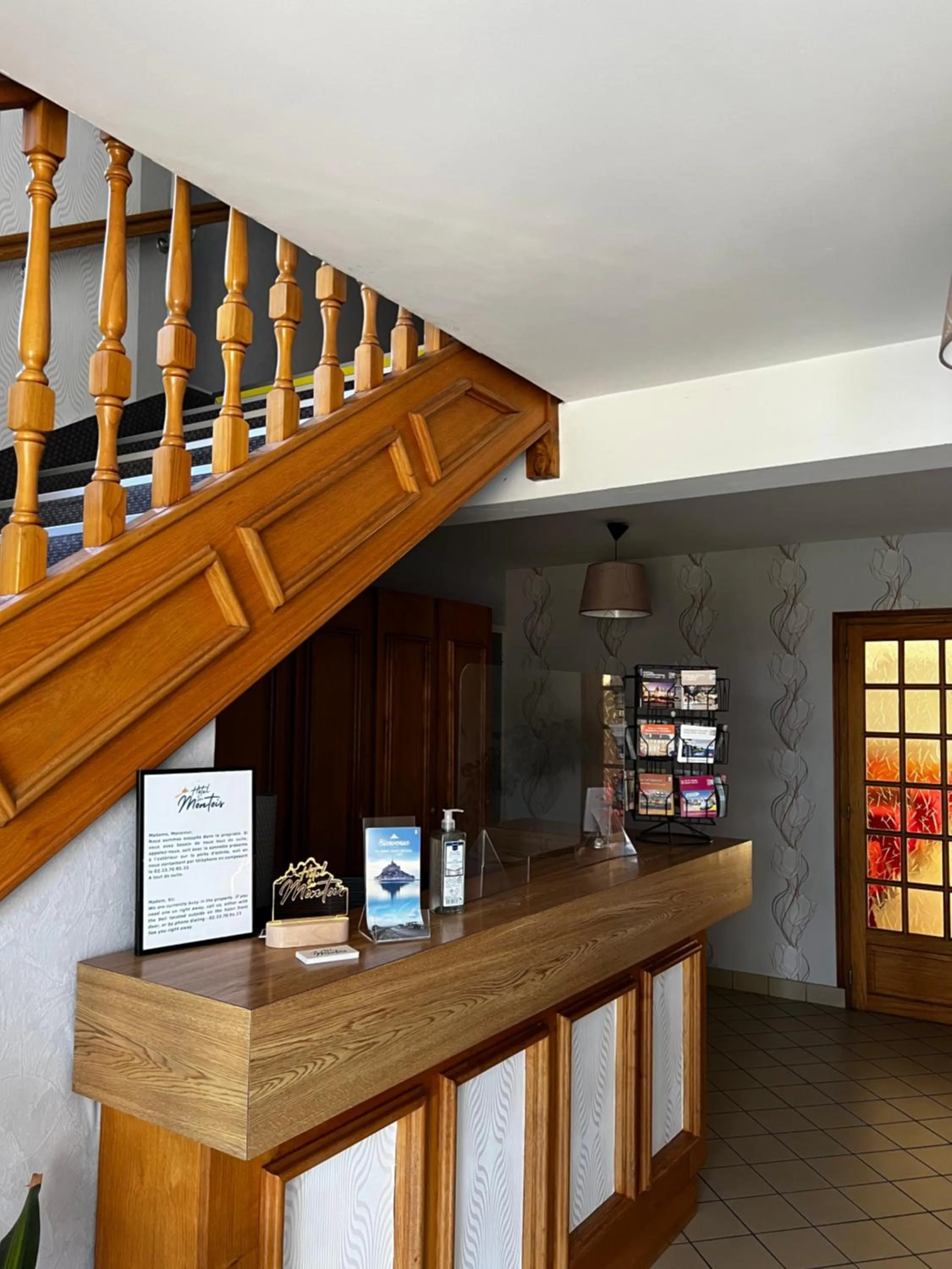 Lobby or reception in Contact Hotel Les Montois