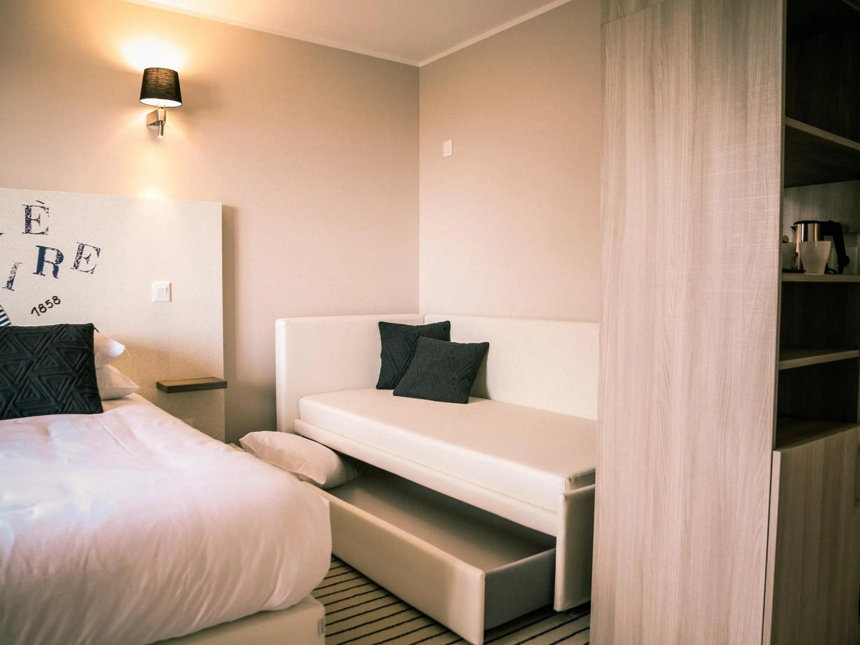 Seating area, Bed in Best Western Plus Antibes Riviera