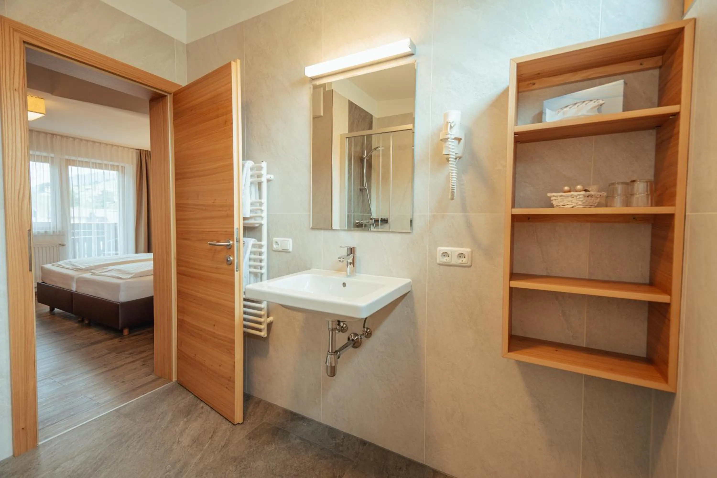 Bathroom, Bed in Hotel Gesser
