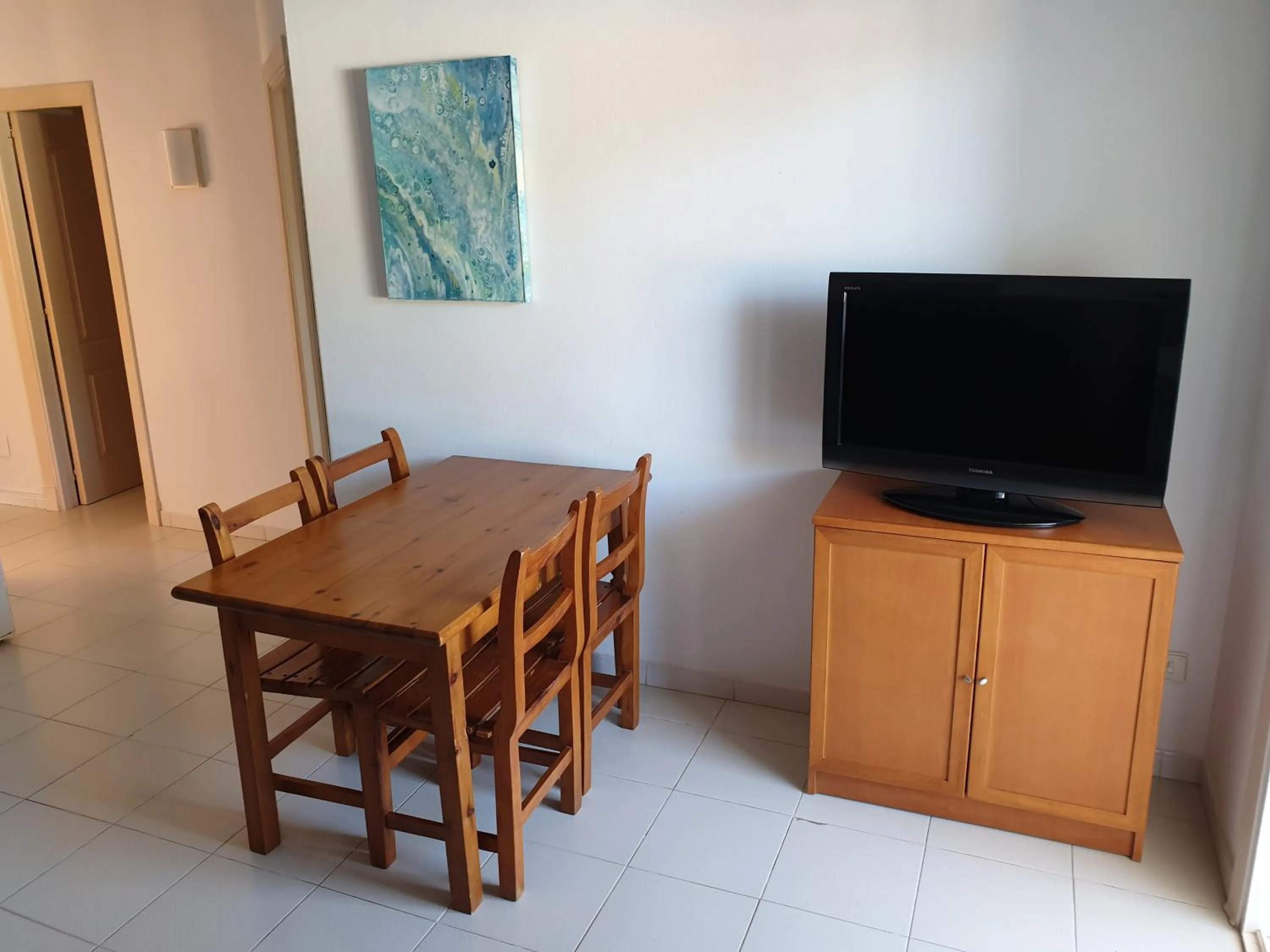 TV and multimedia in Apartamentos Piscis