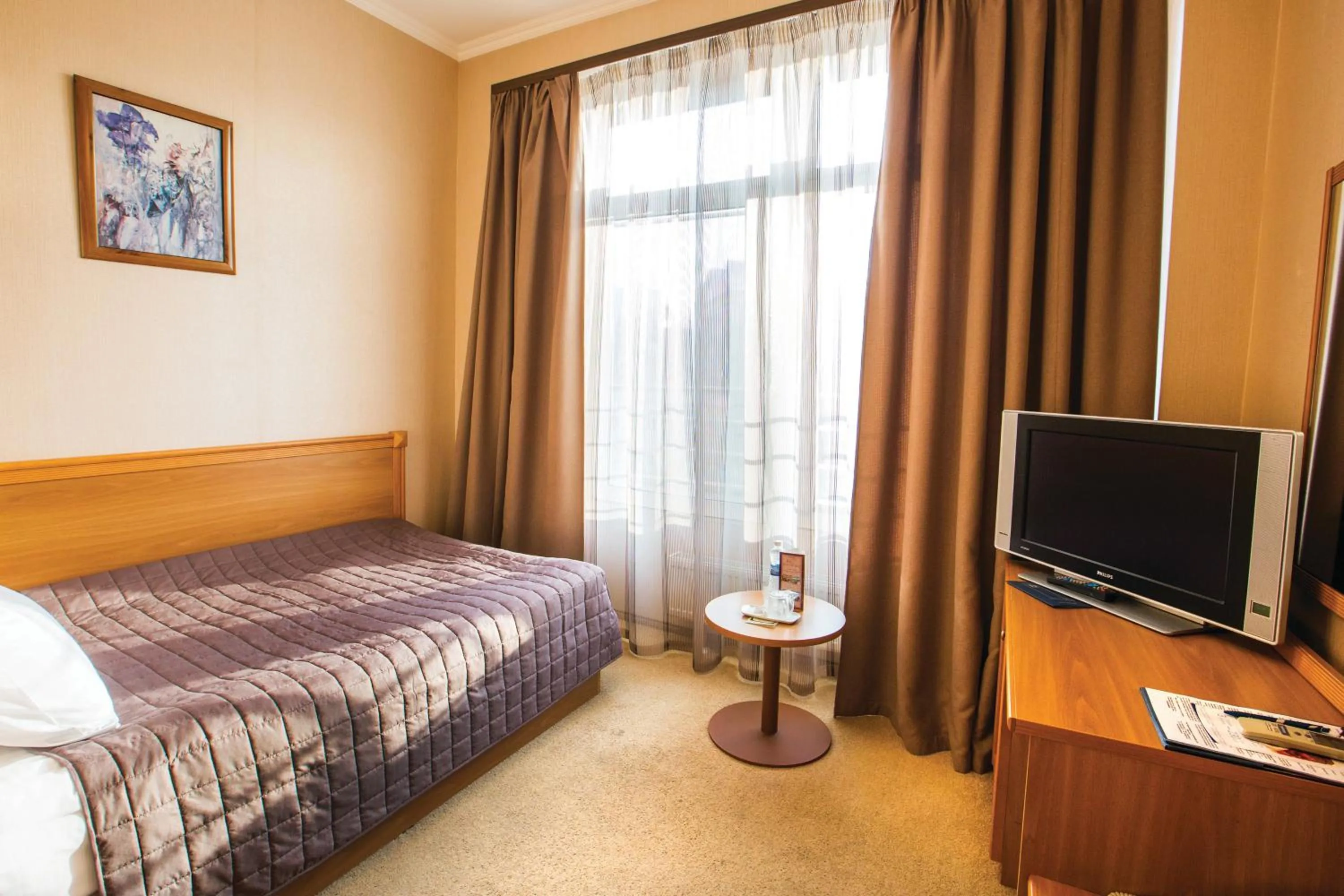 Bed in Готель Дніпро Dnipro Hotel