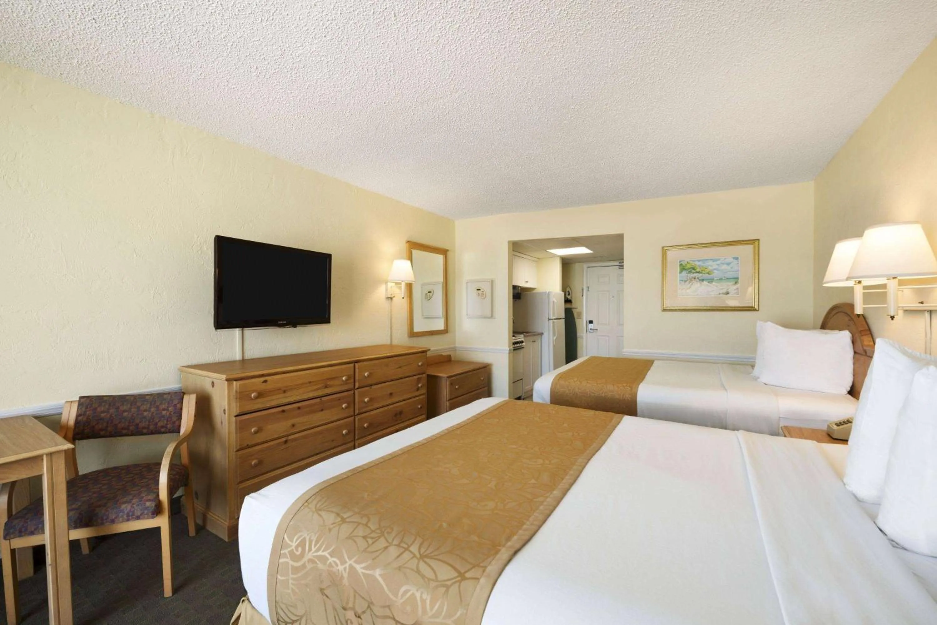 Bed in Days Inn by Wyndham Daytona Oceanfront