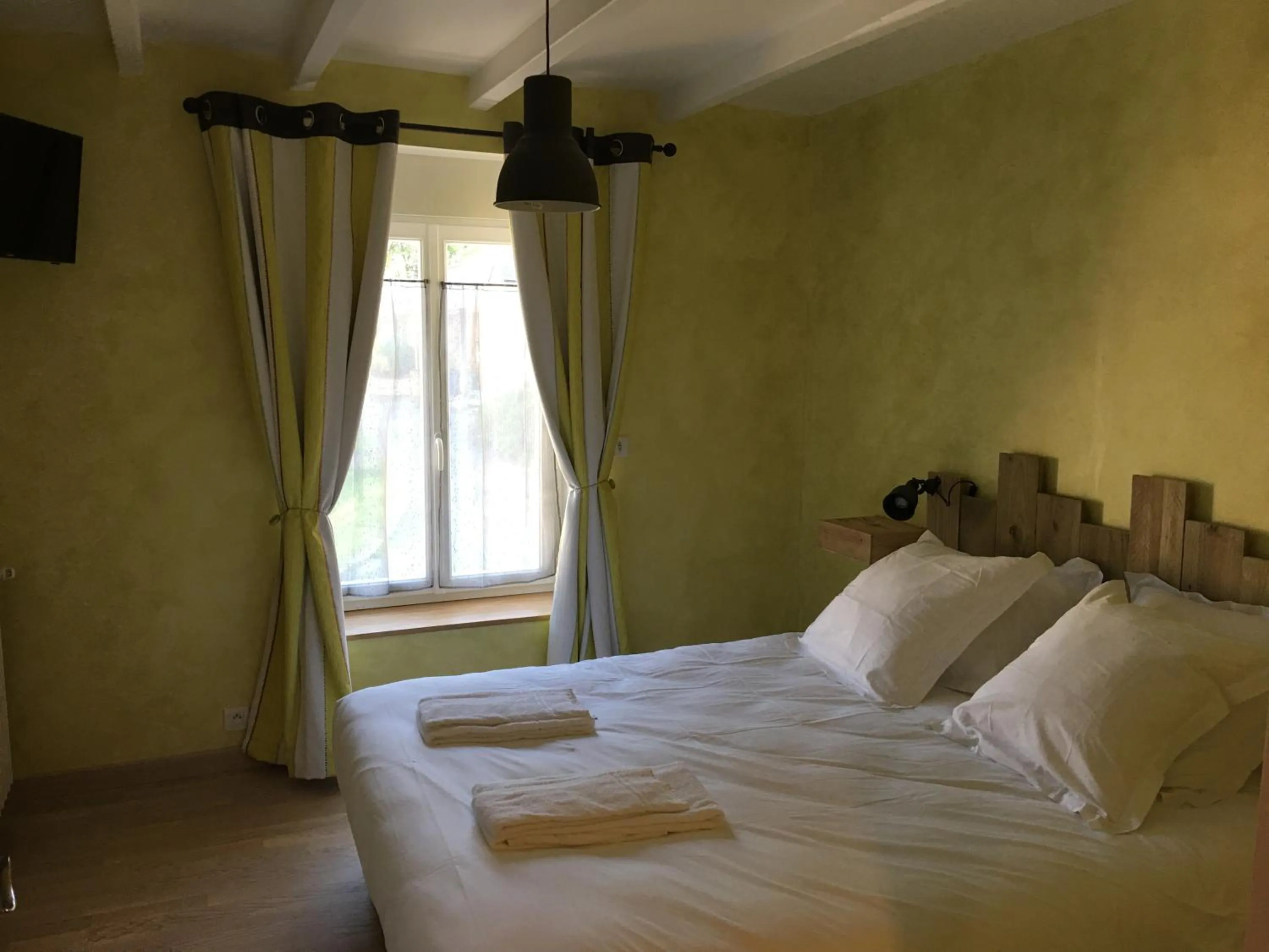 Bed in Les chambres de La Métairie du Dick