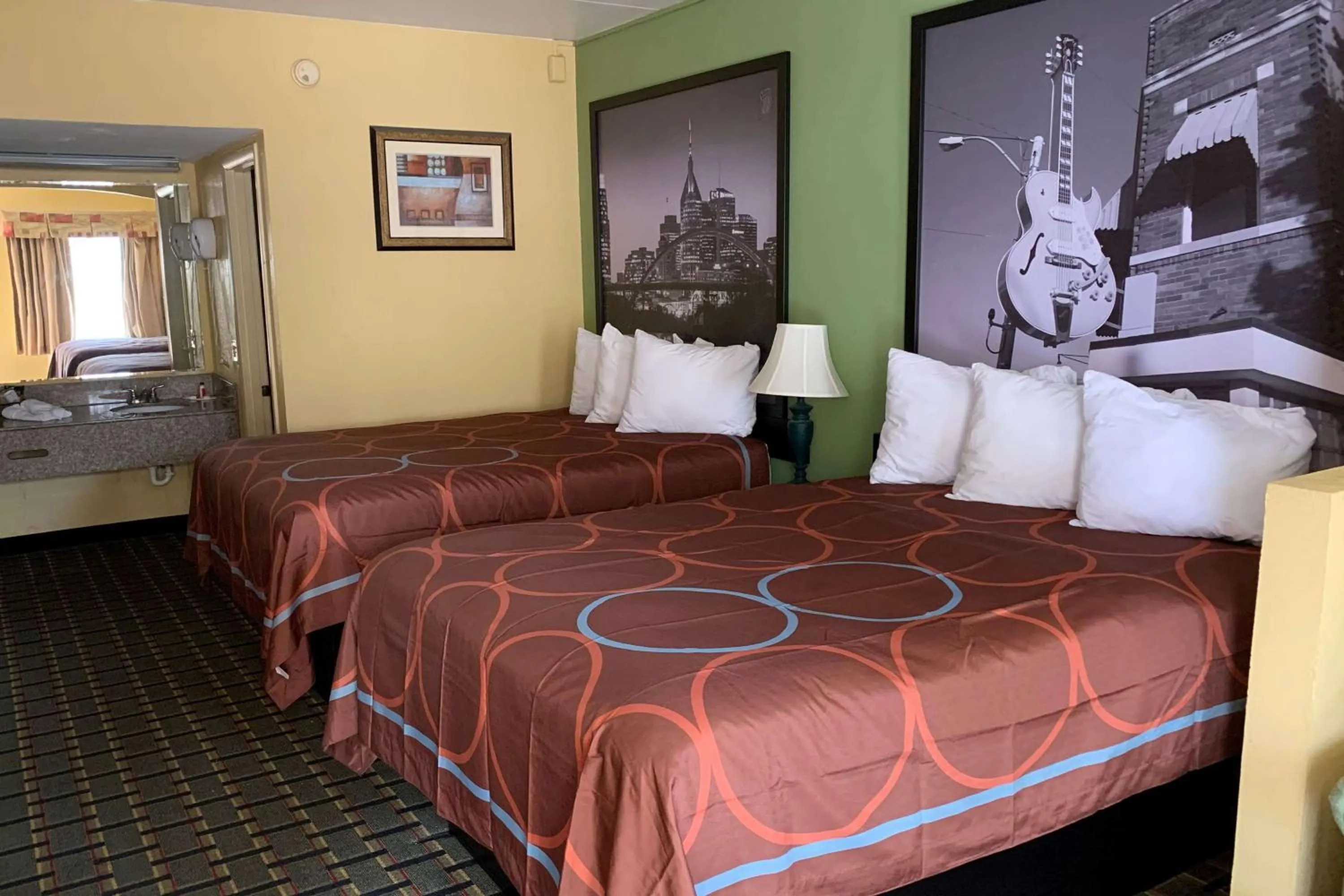 Photo of the whole room, Bed in Super 8 by Wyndham Nashville Near Downtown / I-40